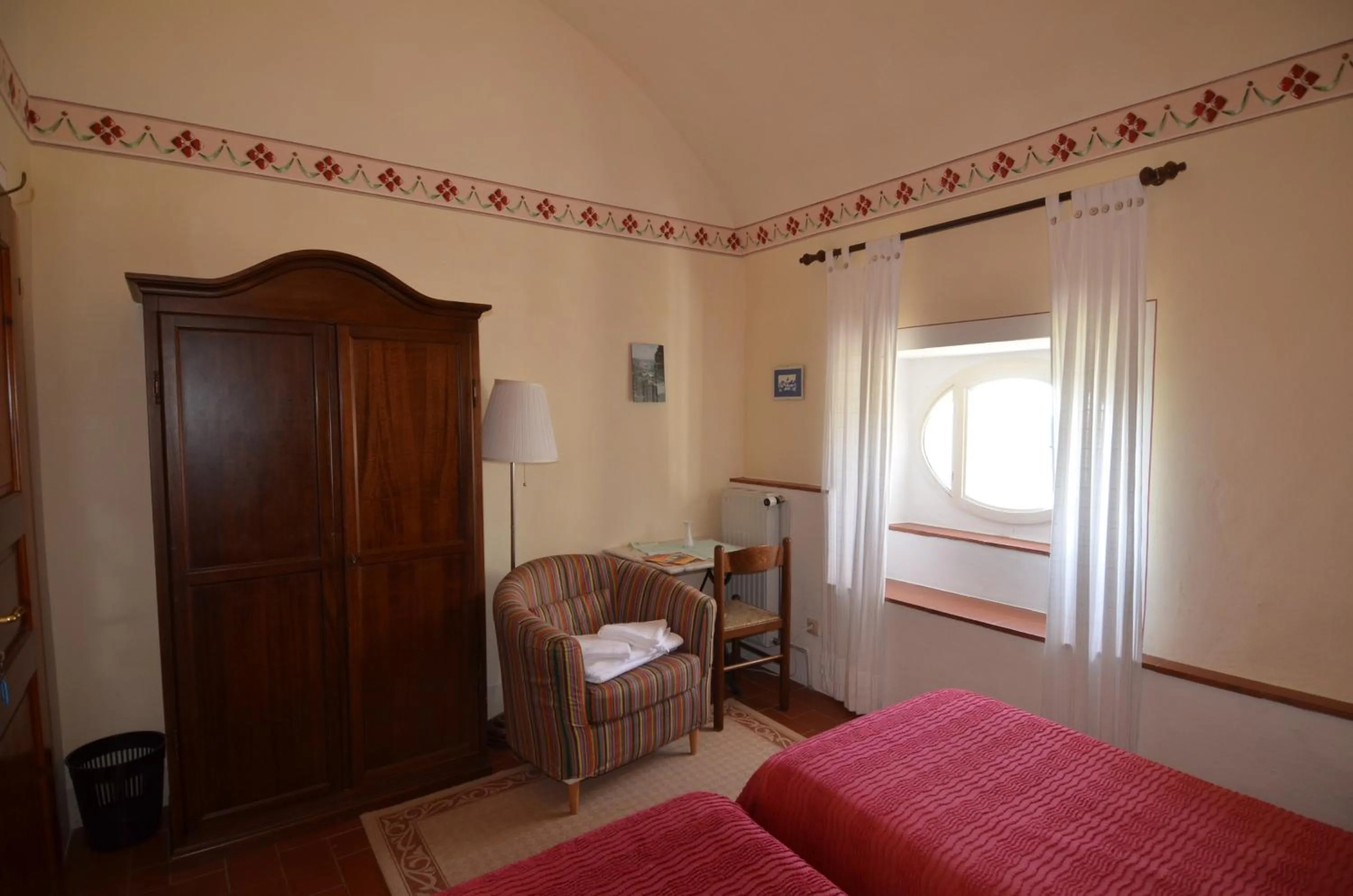Photo of the whole room, Bed in Villa Palagione Centro Interculturale