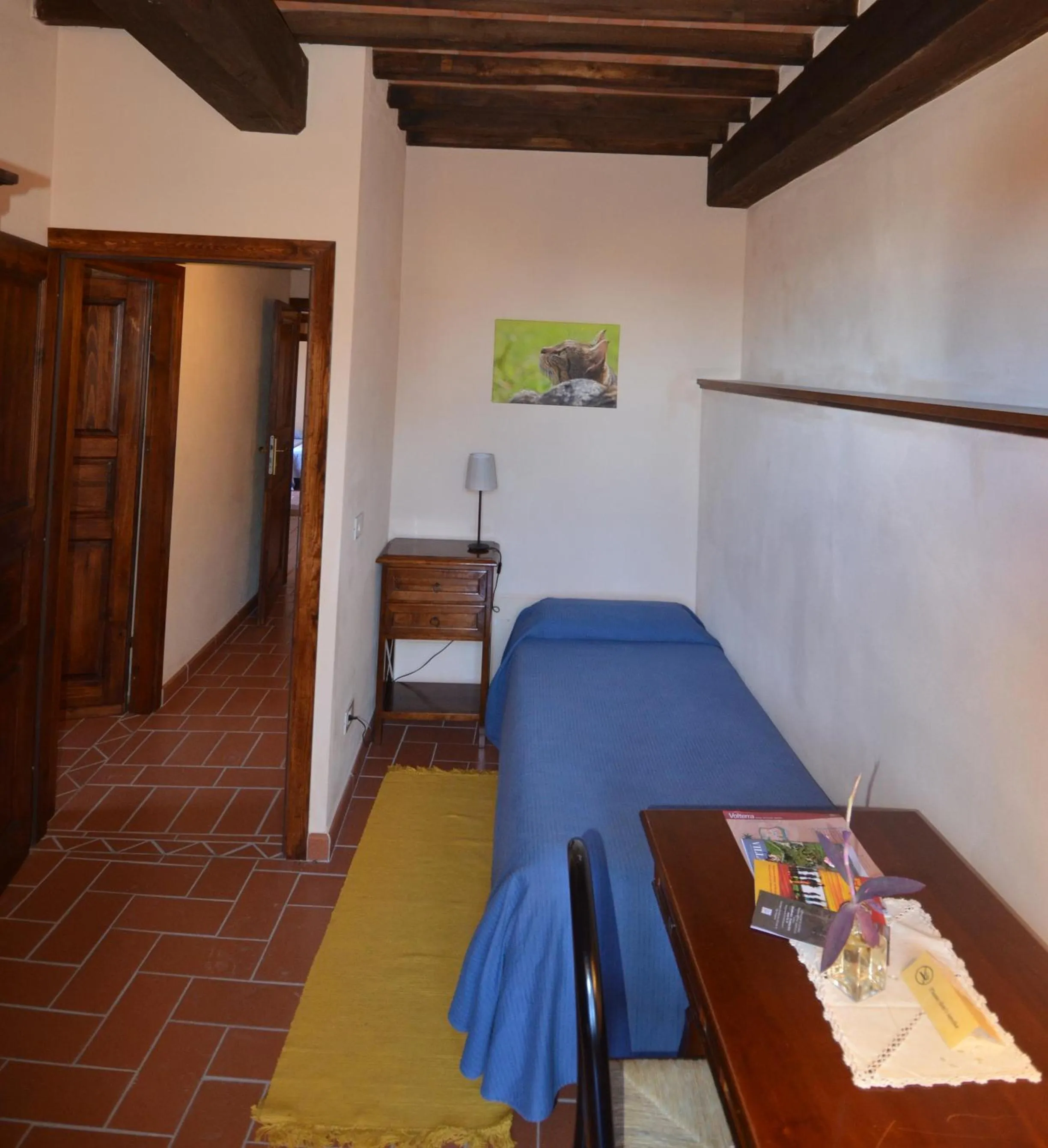 Photo of the whole room, Bed in Villa Palagione Centro Interculturale