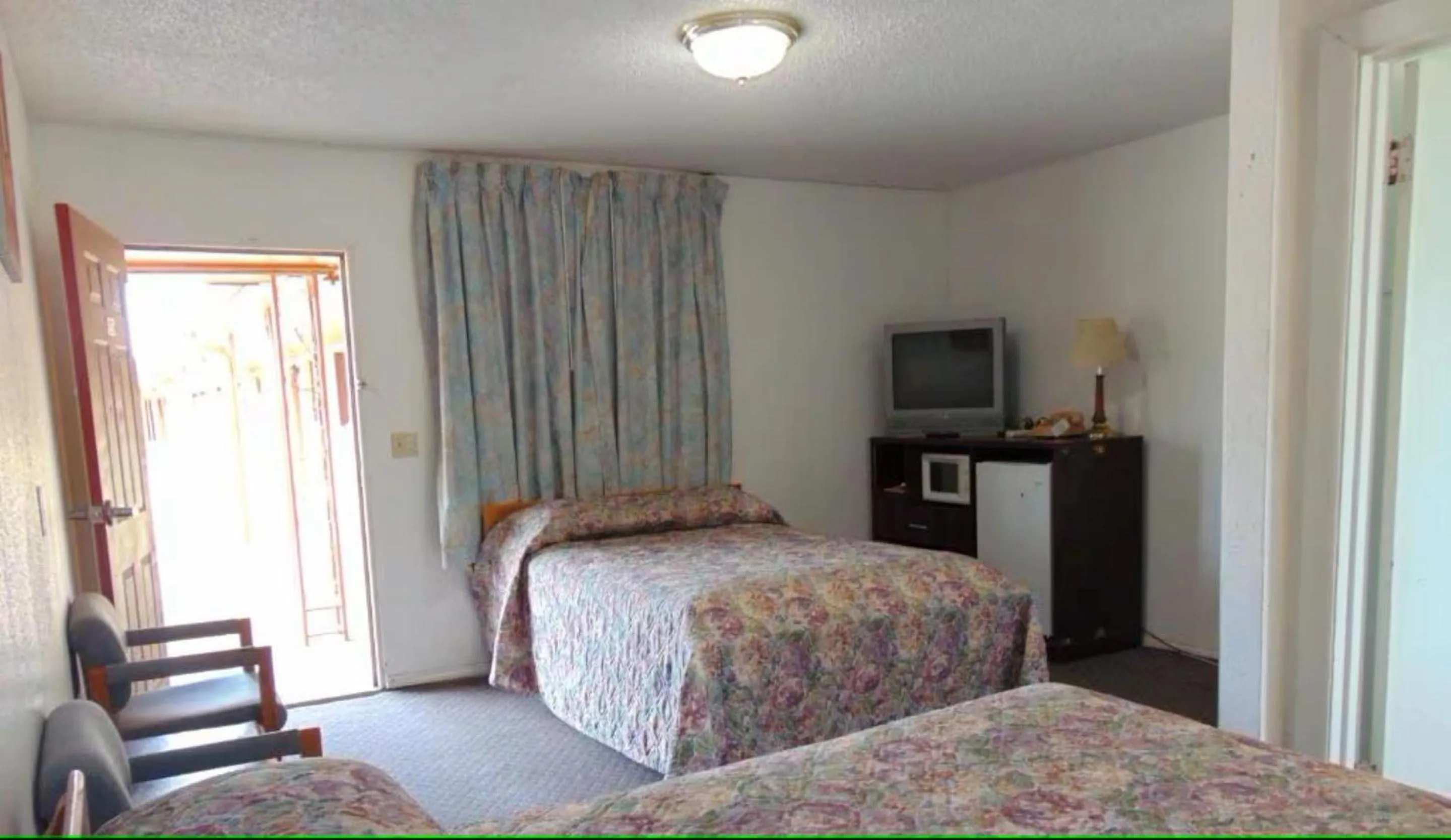 Bedroom in Heritage Budget Inn By OYO Hwy 84
