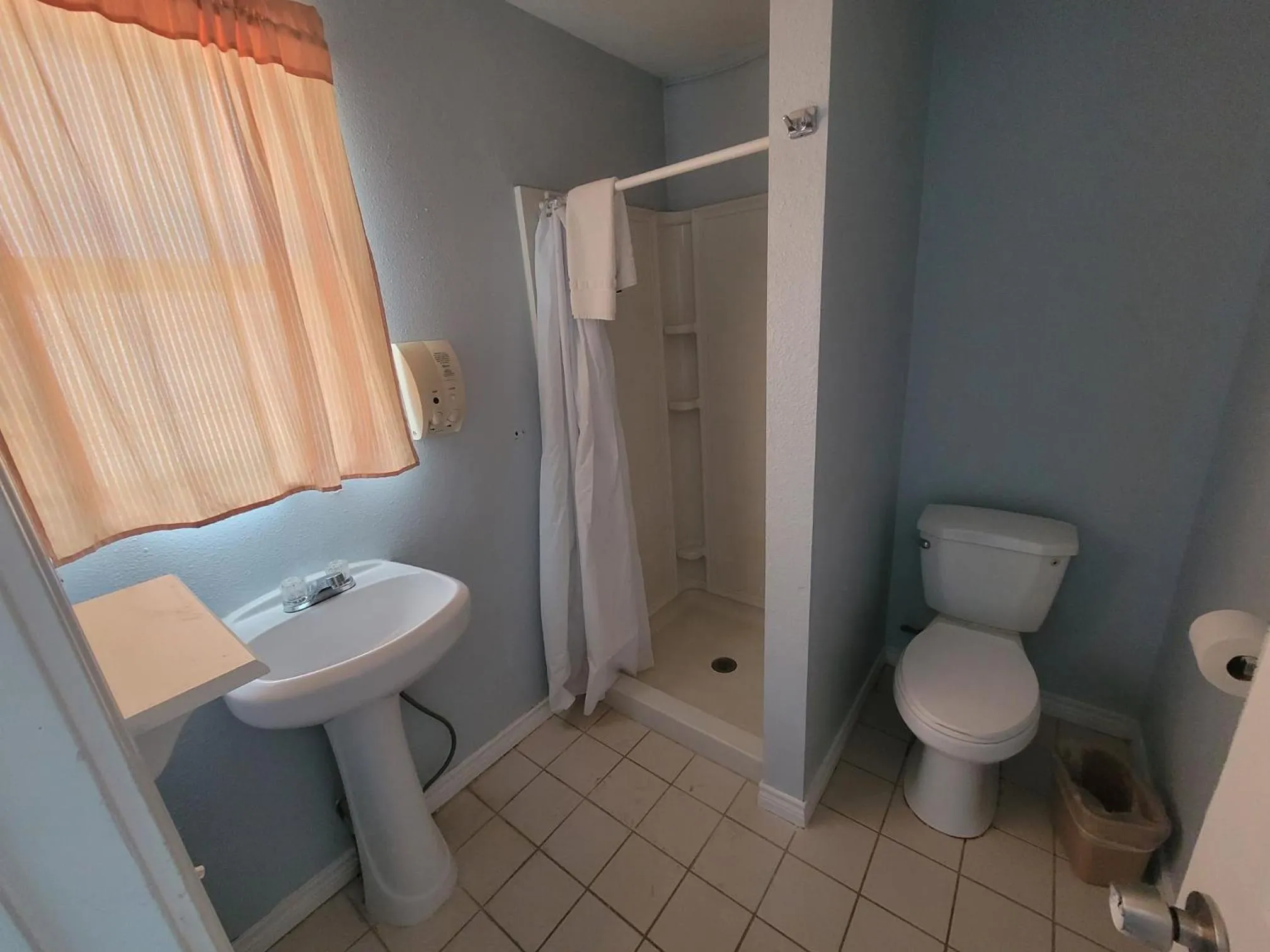 Bathroom in Heritage Budget Inn By OYO Hwy 84