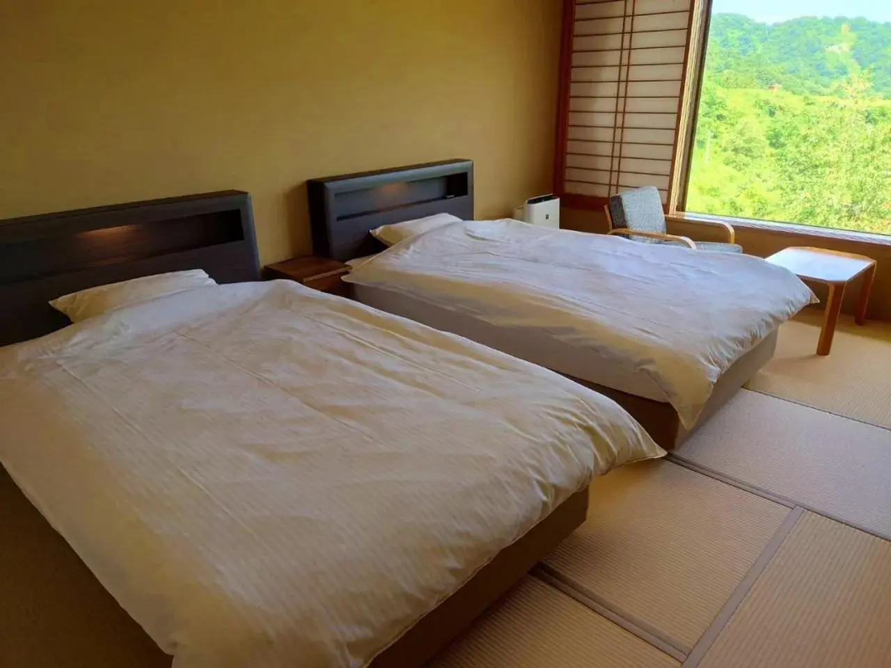 Bed in Sasakura onsen Ryuunso Bed in Sasakura onsen Ryuunso