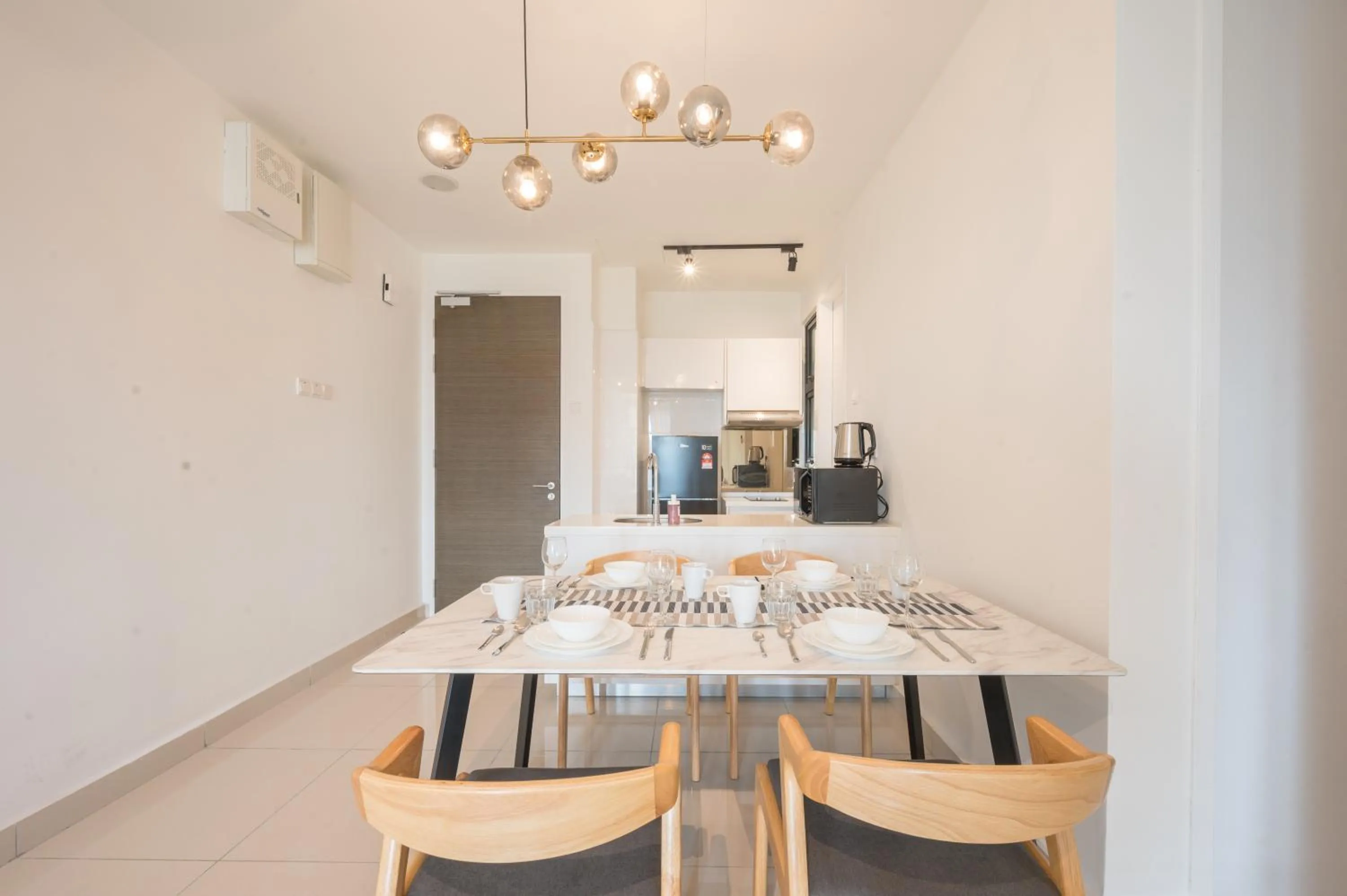 Dining area in H20 Residence Ara Damansara by Airhost