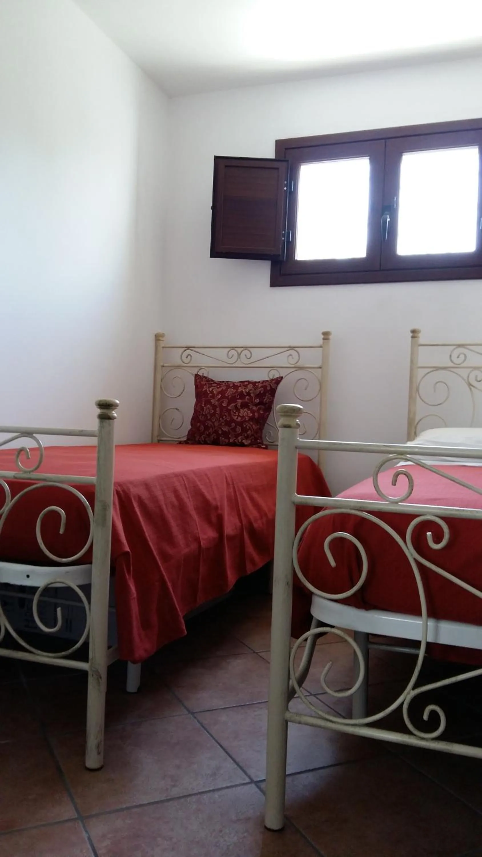 Photo of the whole room, Bed in Portoselvaggio Villa Martina
