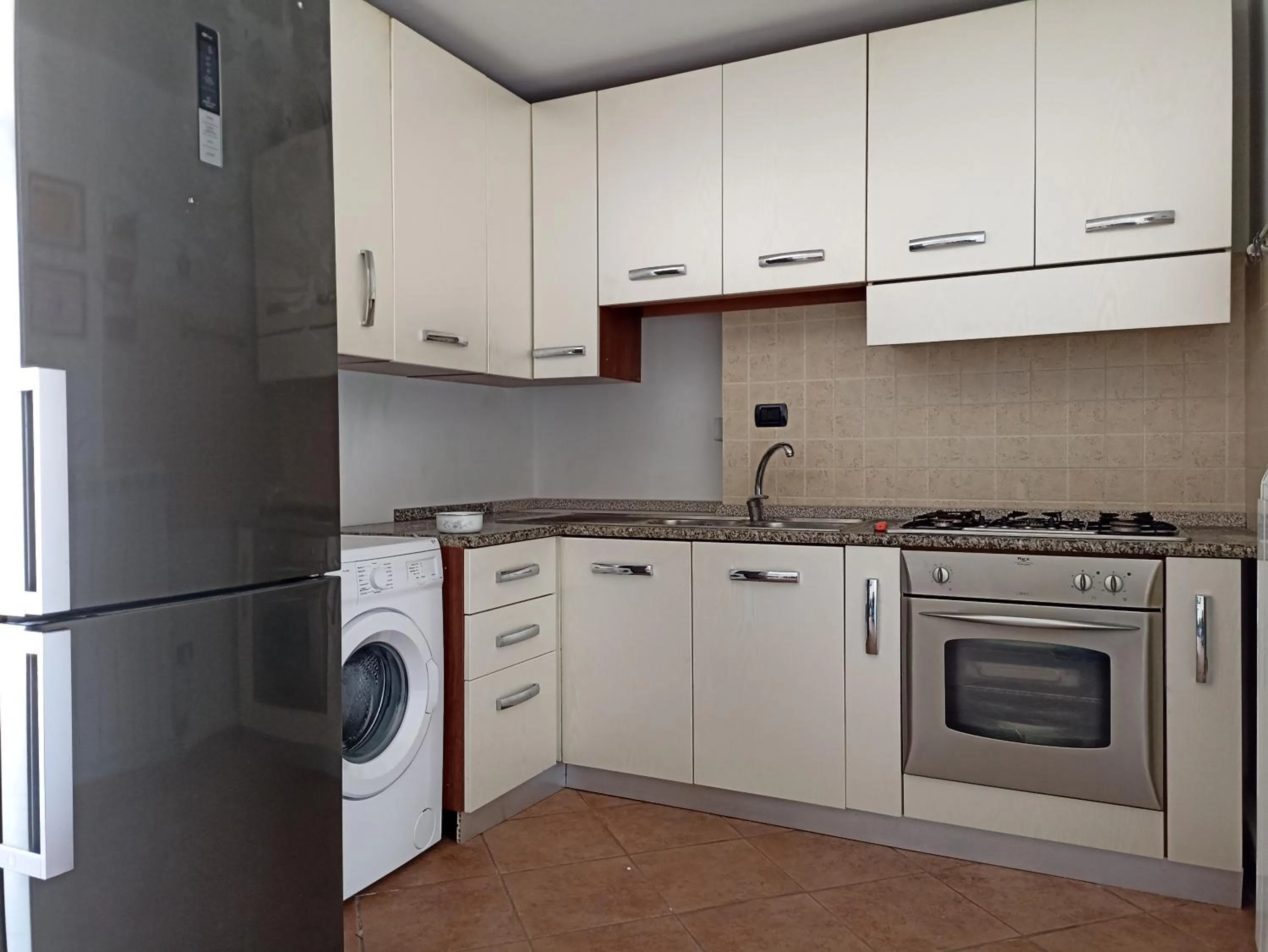Kitchen or kitchenette in Portoselvaggio Villa Martina