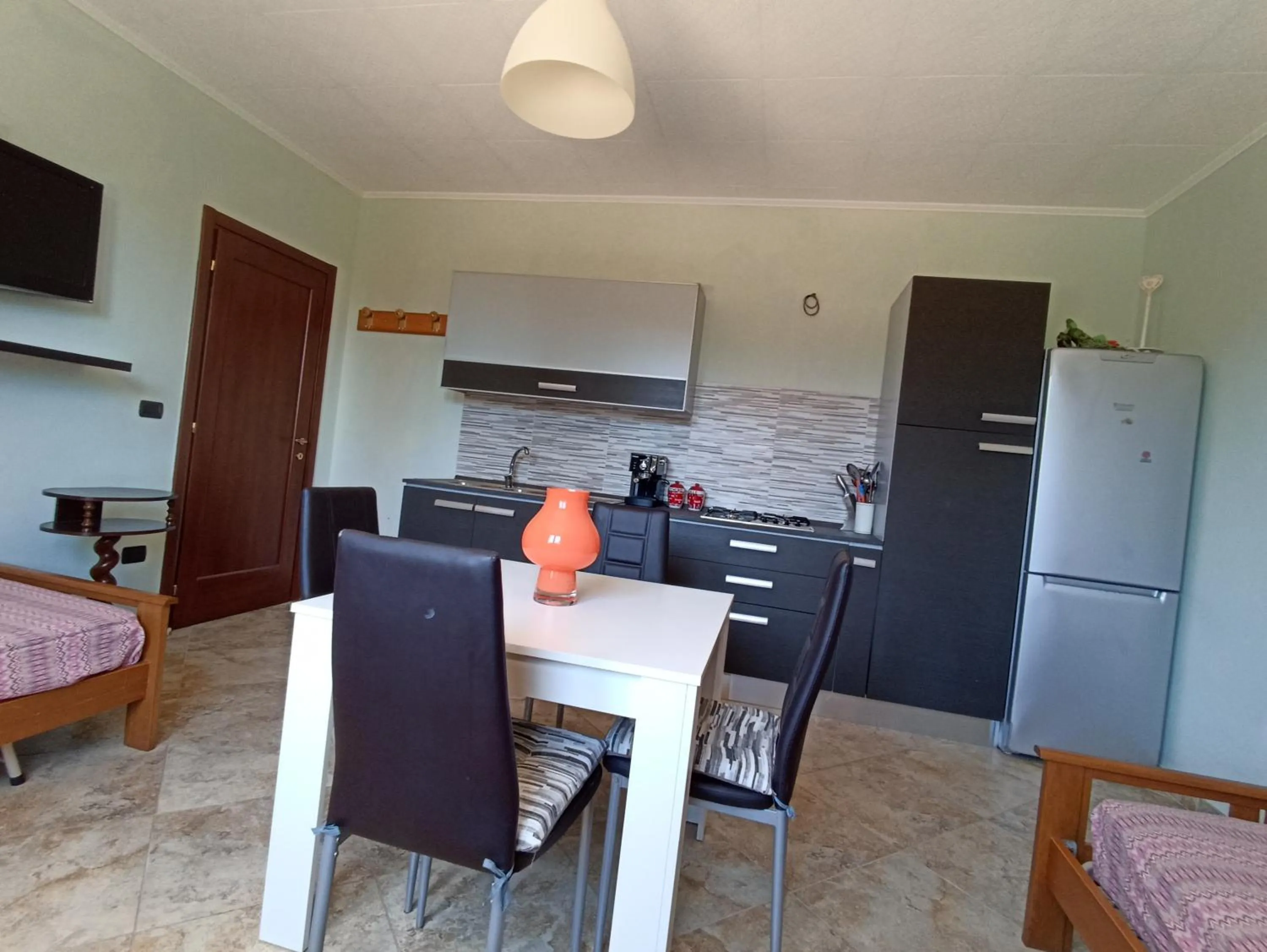 Kitchen or kitchenette in Portoselvaggio Villa Martina