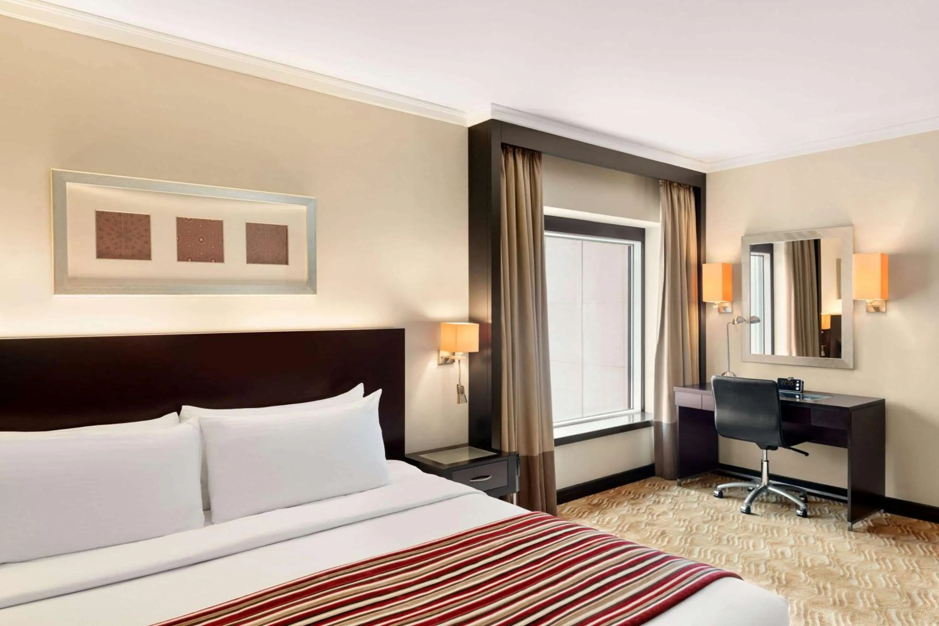 Photo of the whole room, Bed in Ramada Plaza by Wyndham Dubai Deira