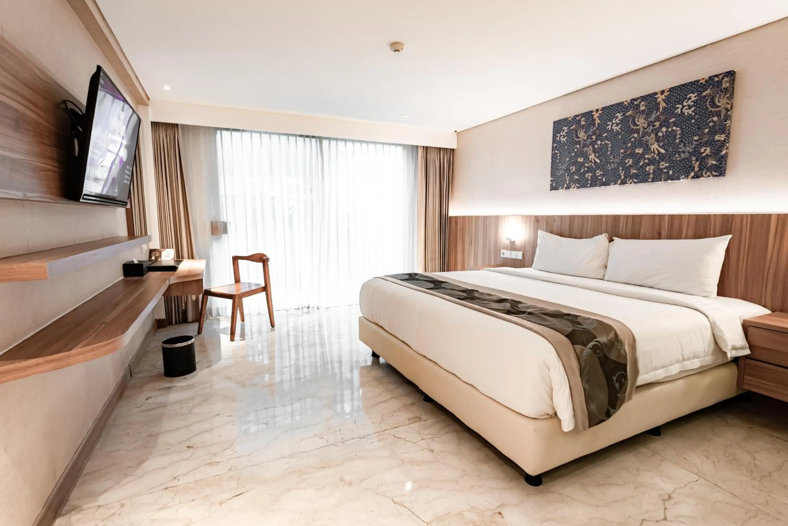 Bed in The Capital Hotel and Resort Seminyak