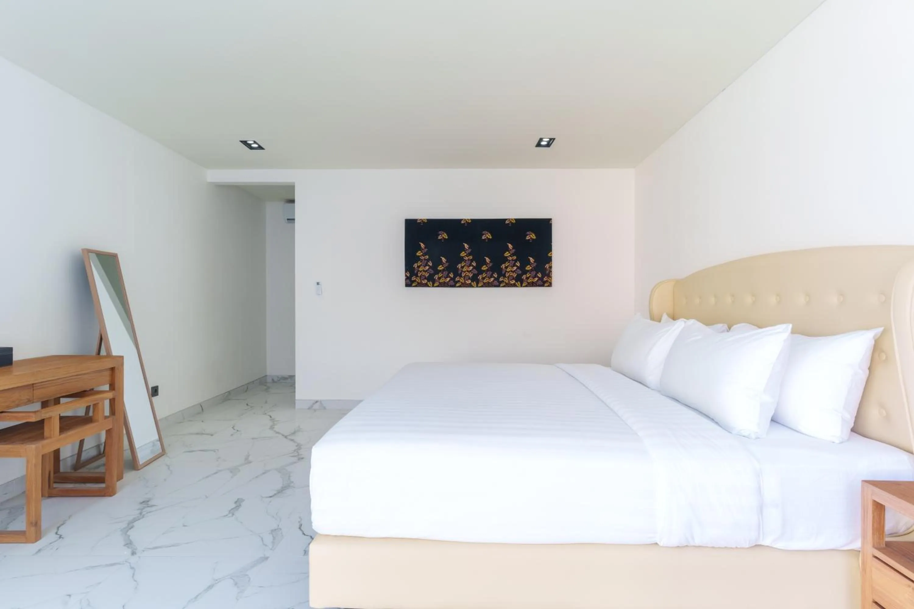 Bed in The Capital Hotel and Resort Seminyak