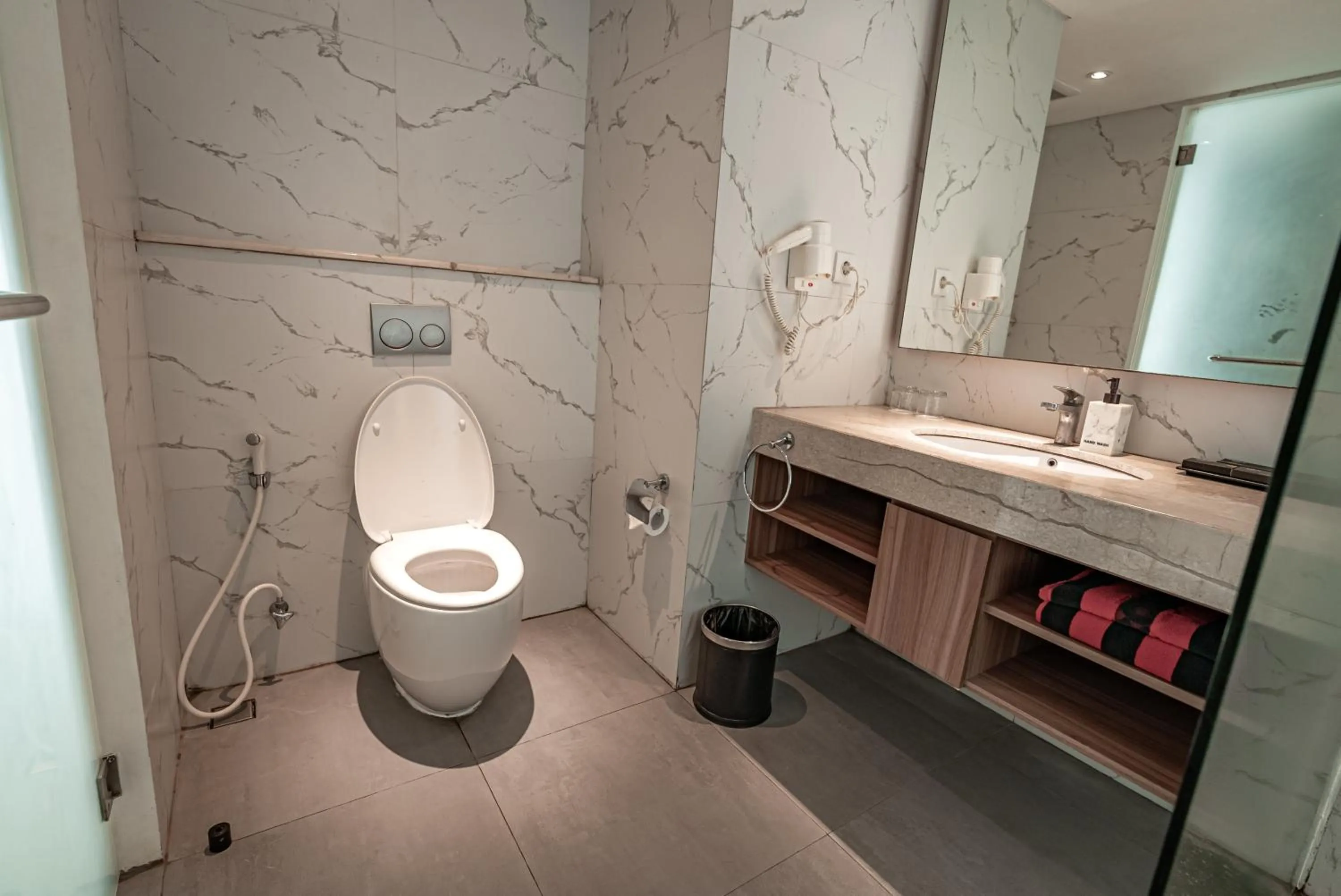 Toilet in The Capital Hotel and Resort Seminyak