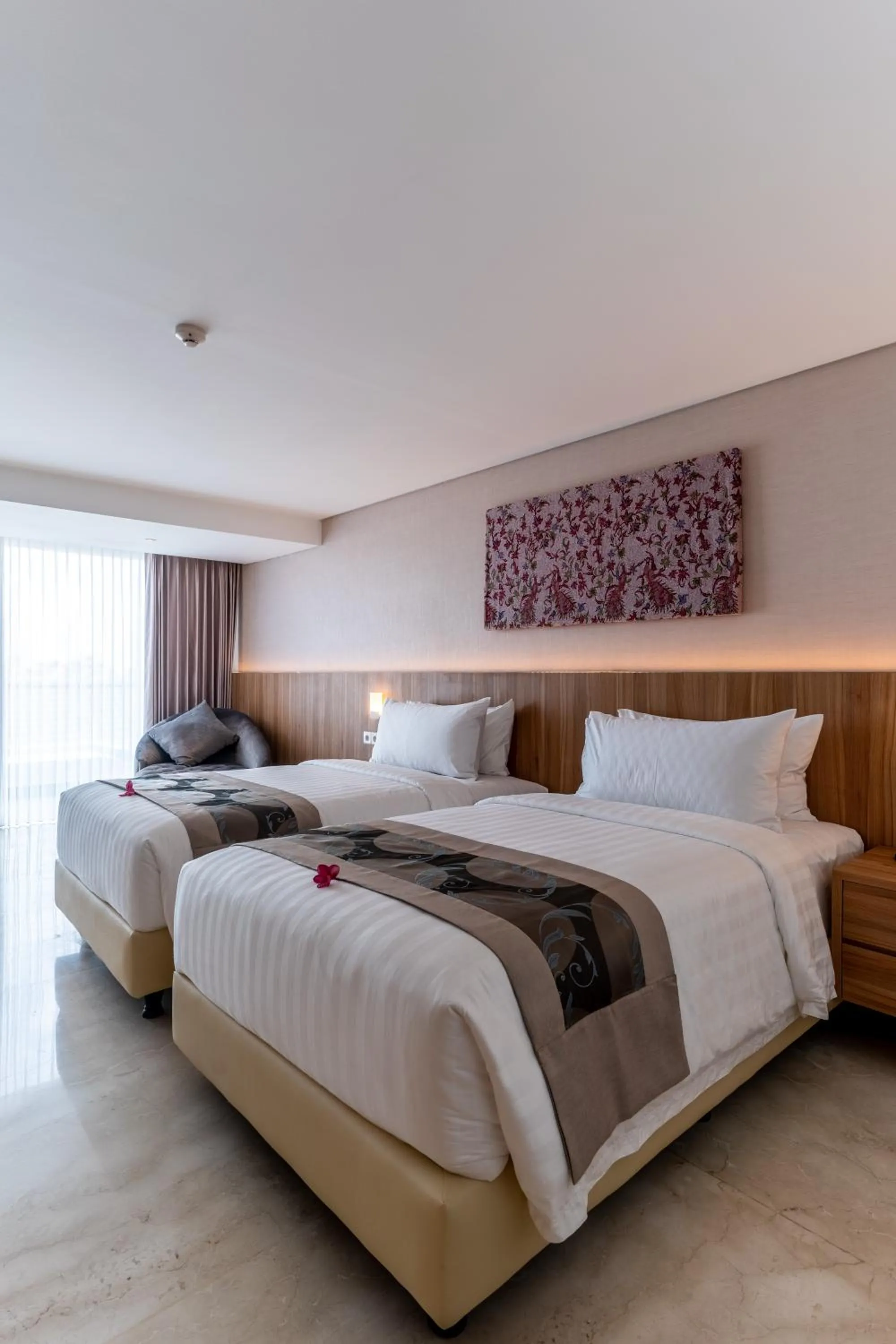 Bed in The Capital Hotel and Resort Seminyak