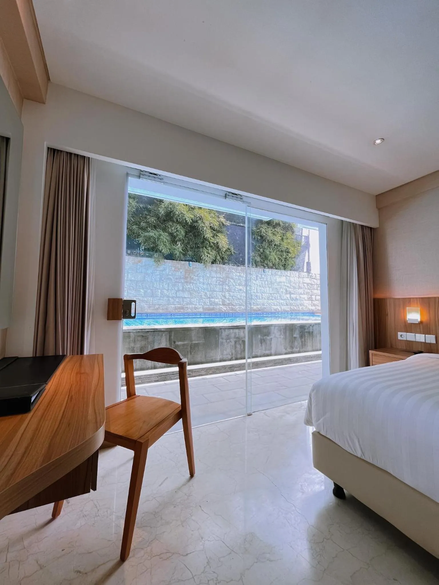 Bed in The Capital Hotel and Resort Seminyak