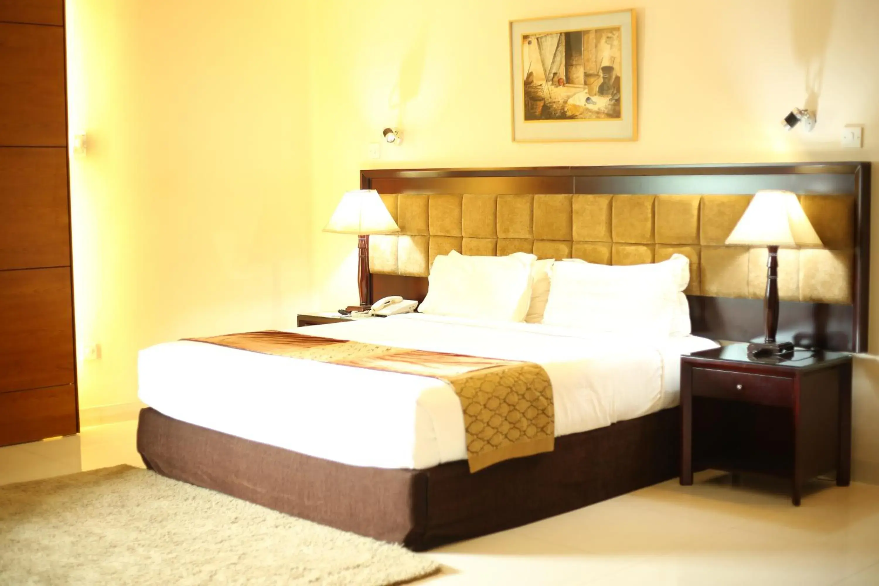 Bed in The Avenue Hotel & Suites Bed in The Avenue Hotel & Suites