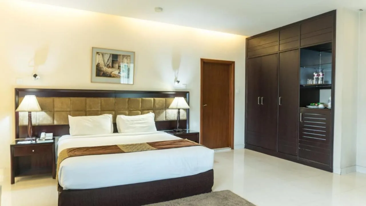 Bed in The Avenue Hotel & Suites