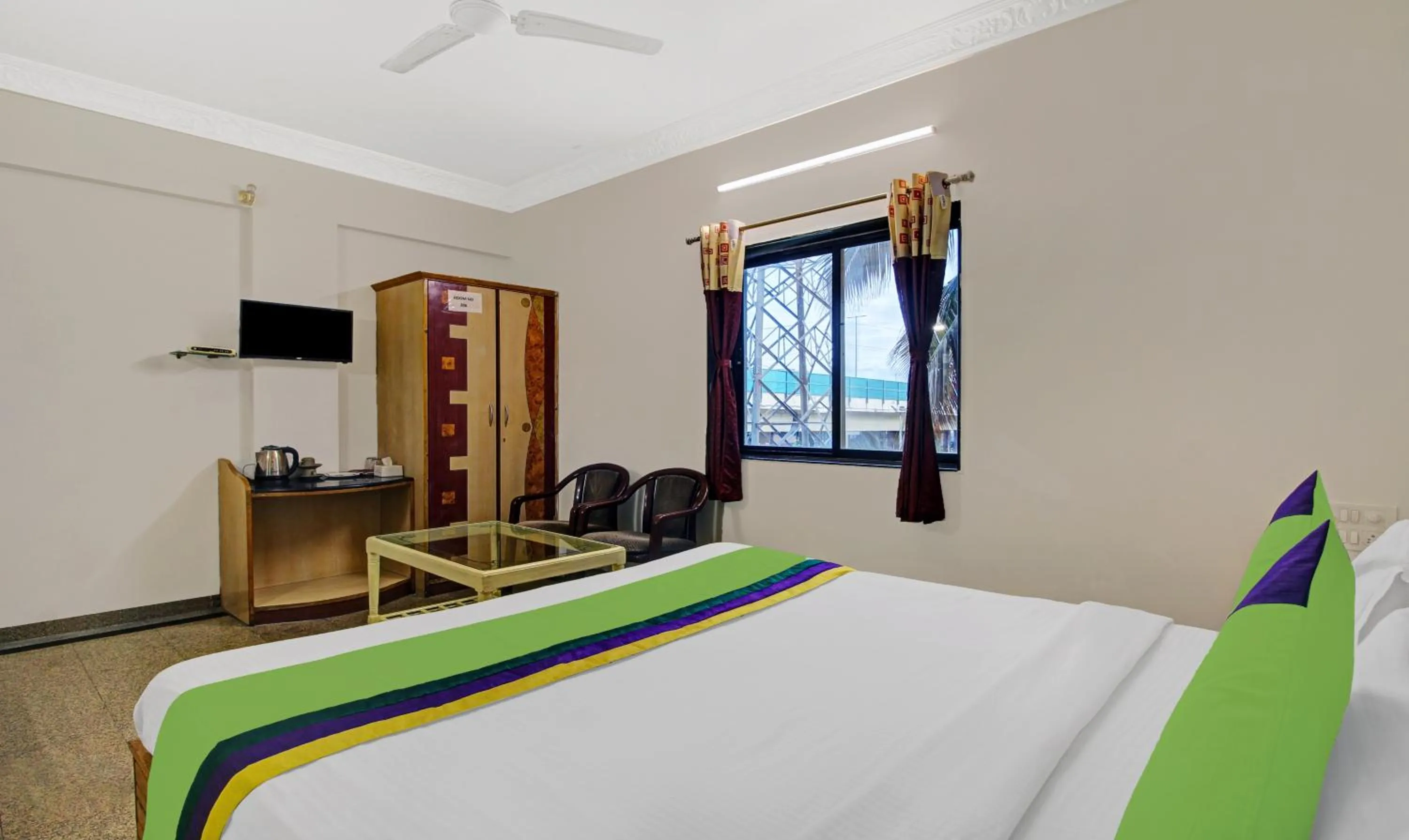 Bedroom, Bed in Treebo Eagle Executive