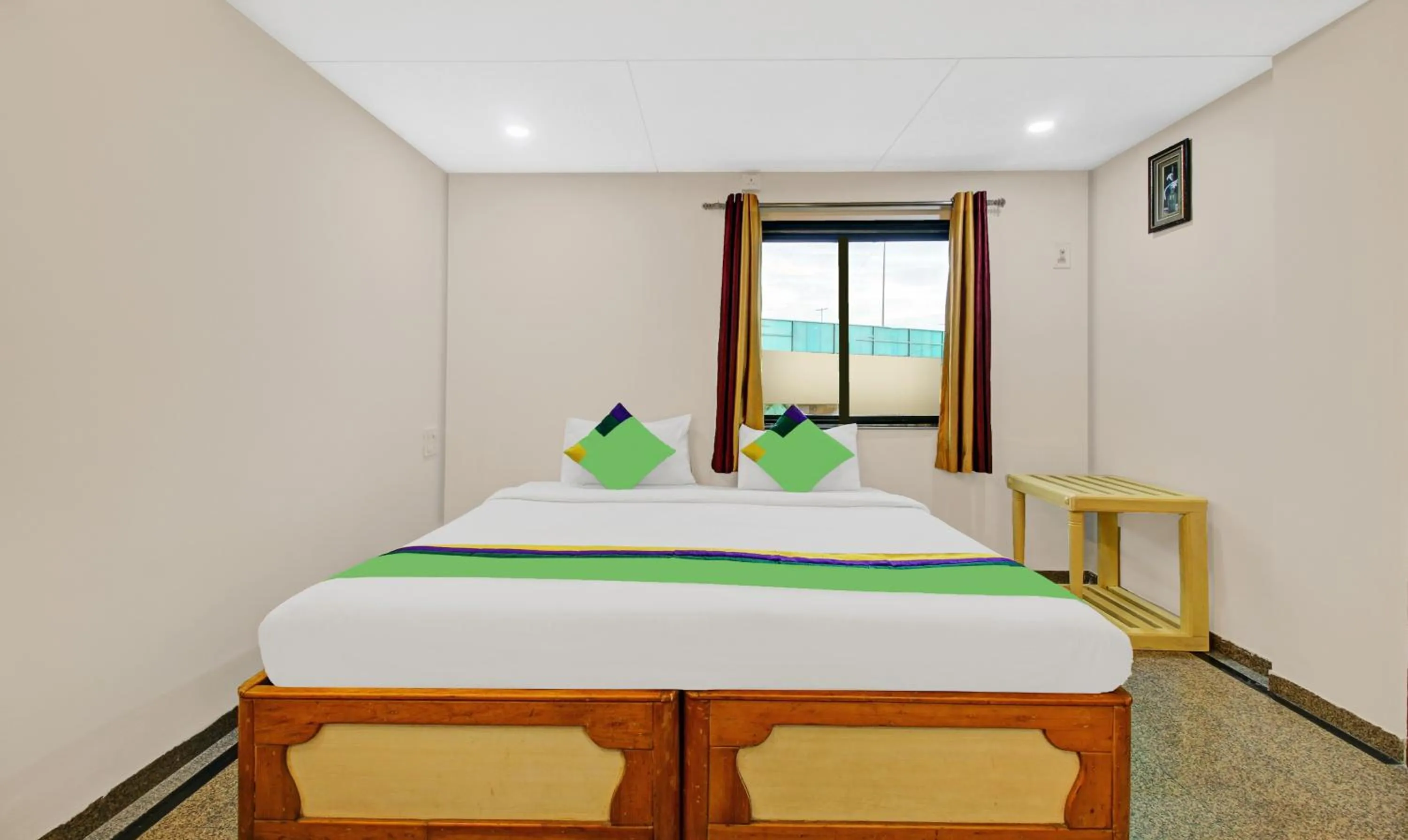 Bedroom, Bed in Treebo Eagle Executive