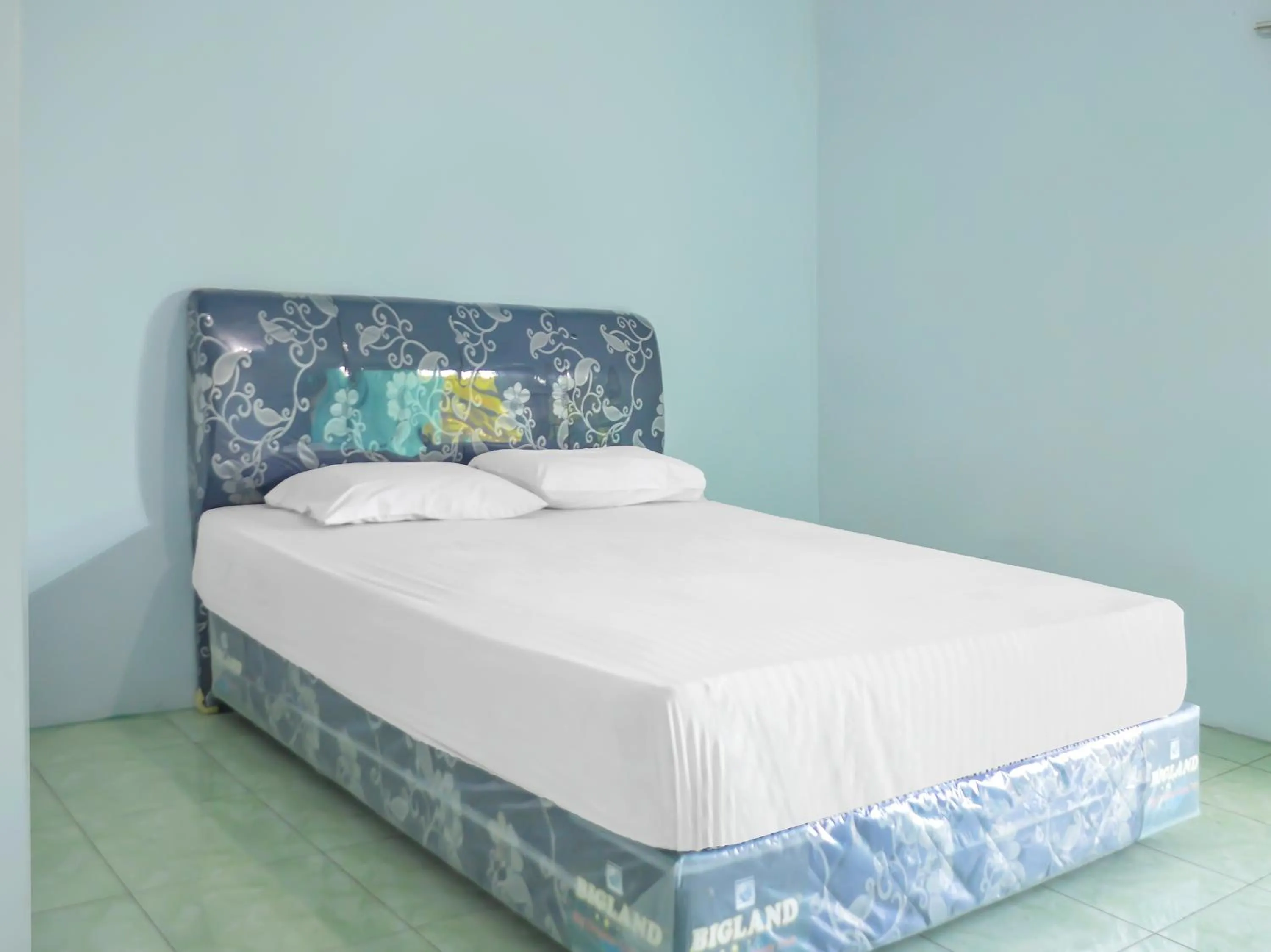 Bedroom in OYO 1745 Guest House Nur Aziziah Syariah 2