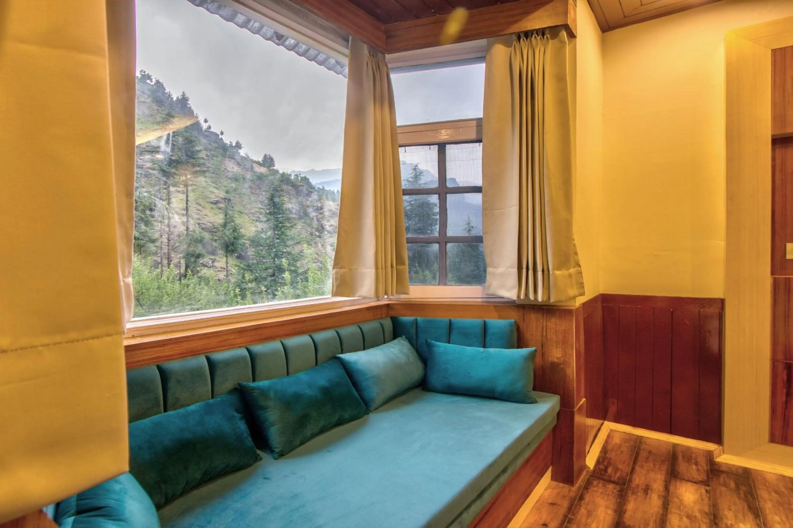 Seating area in Baan by Snow City Farm