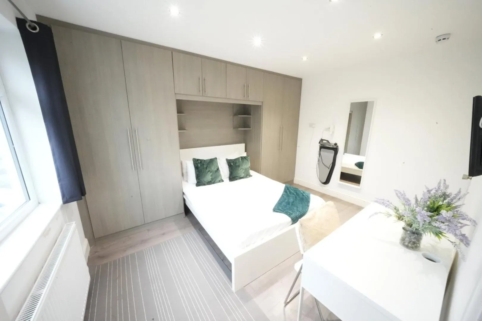 Bed in Grand Airport Ensuites