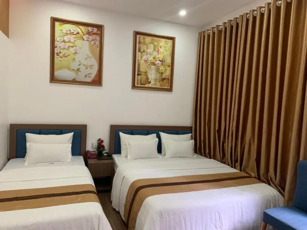 Family Room with Private Bathroom in Duc Long Hotel Family Room with Private Bathroom in Duc Long Hotel