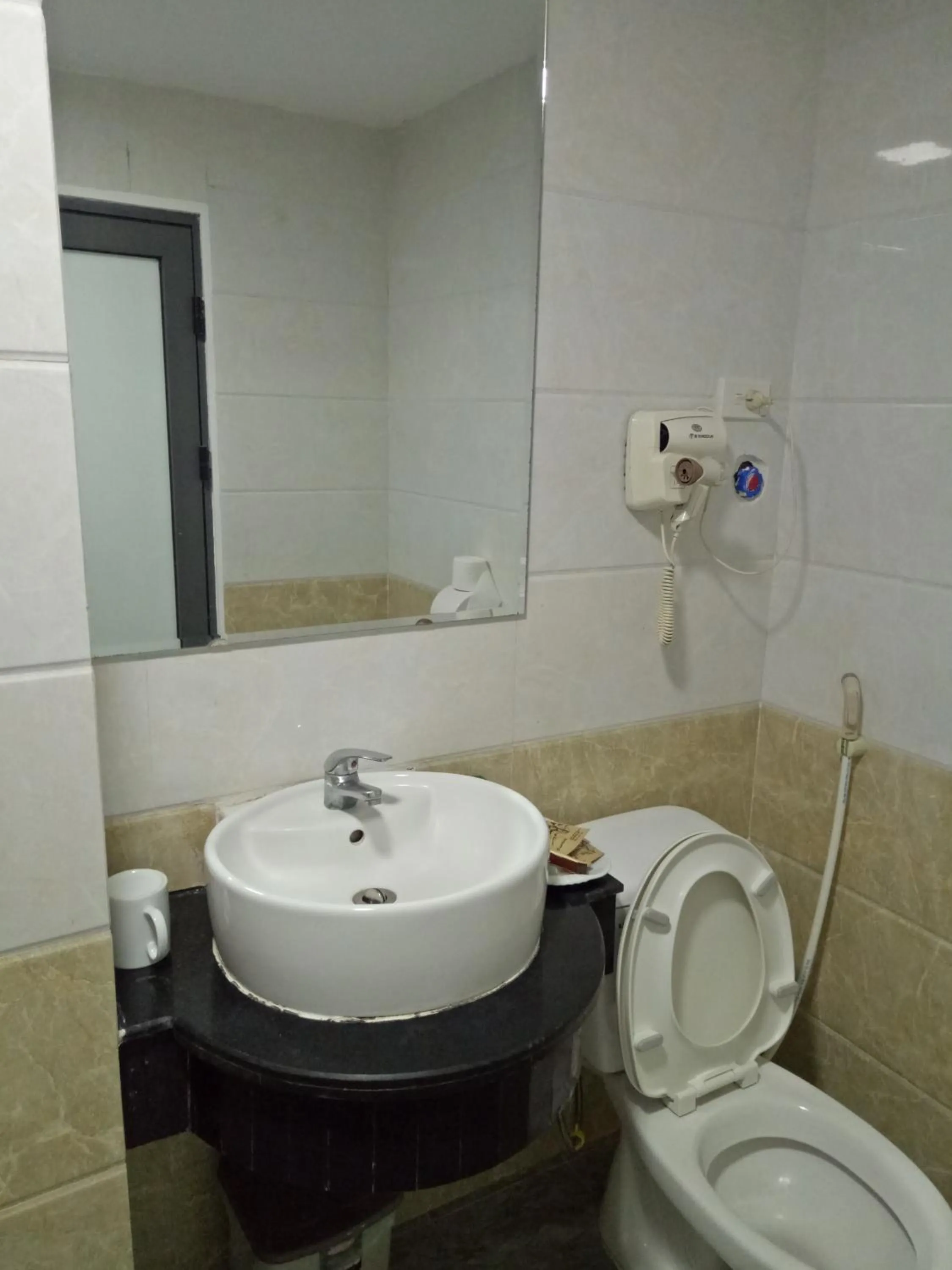 Bathroom in Duc Long Hotel