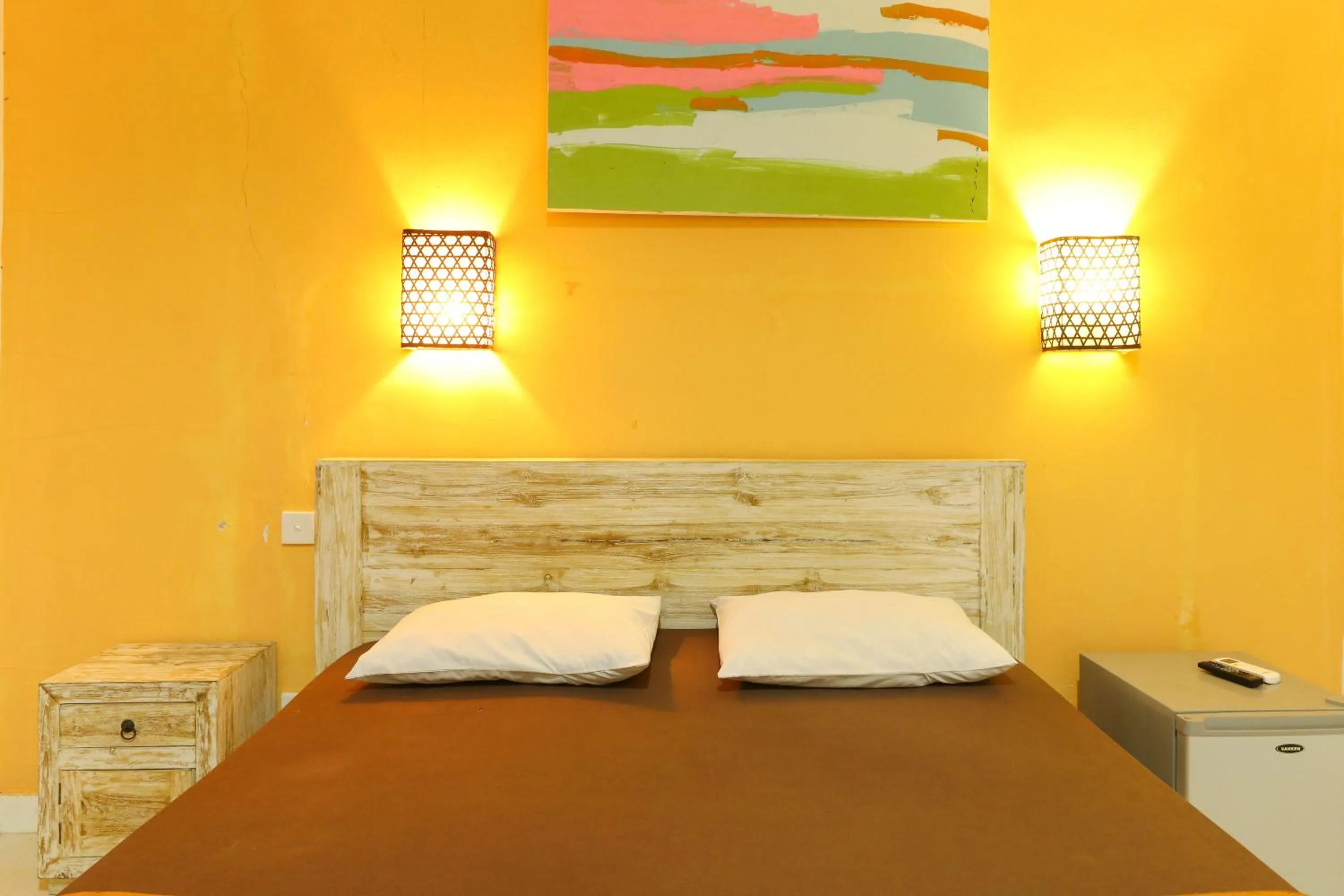 Bed in The Legian Mas Beach Inn