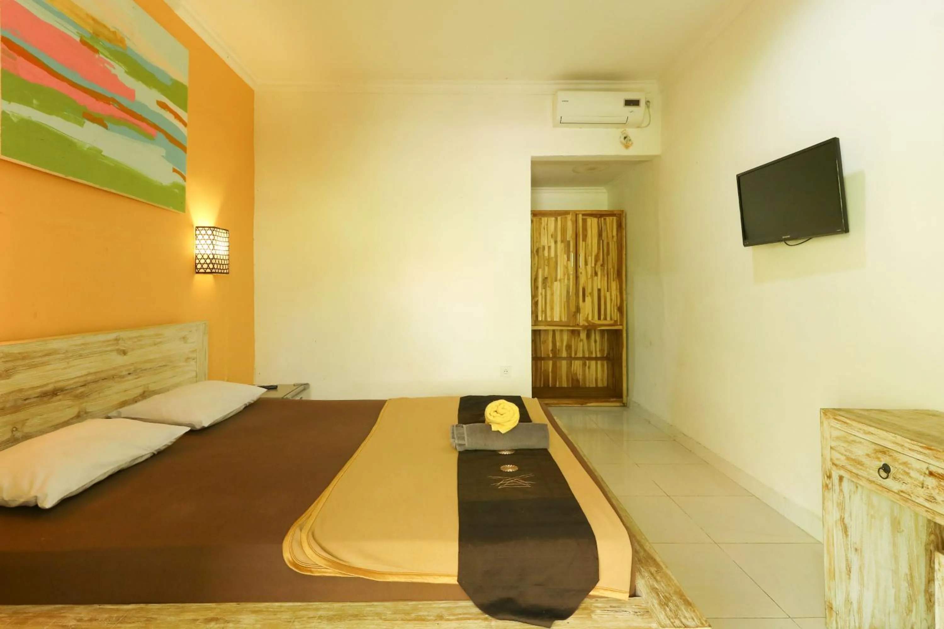Photo of the whole room, Bed in The Legian Mas Beach Inn