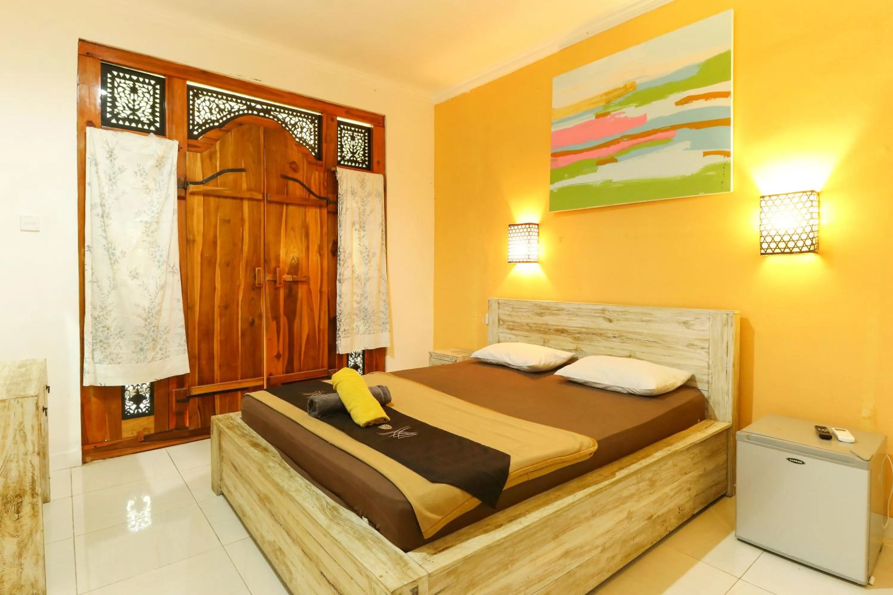 Bed in The Legian Mas Beach Inn