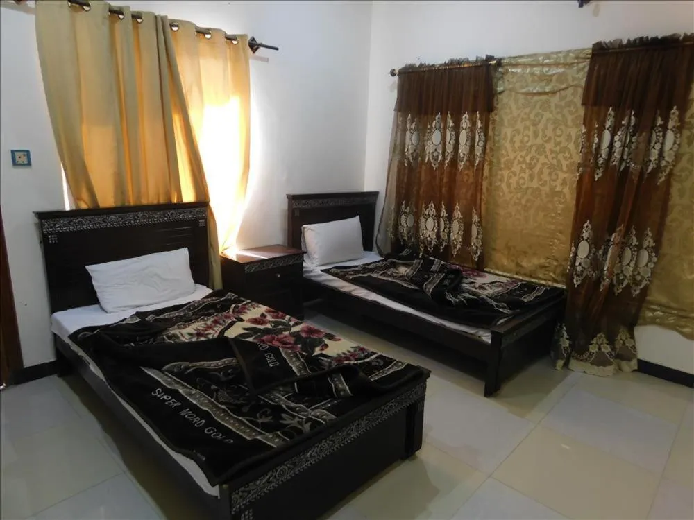 Bed in Usmania Guest House