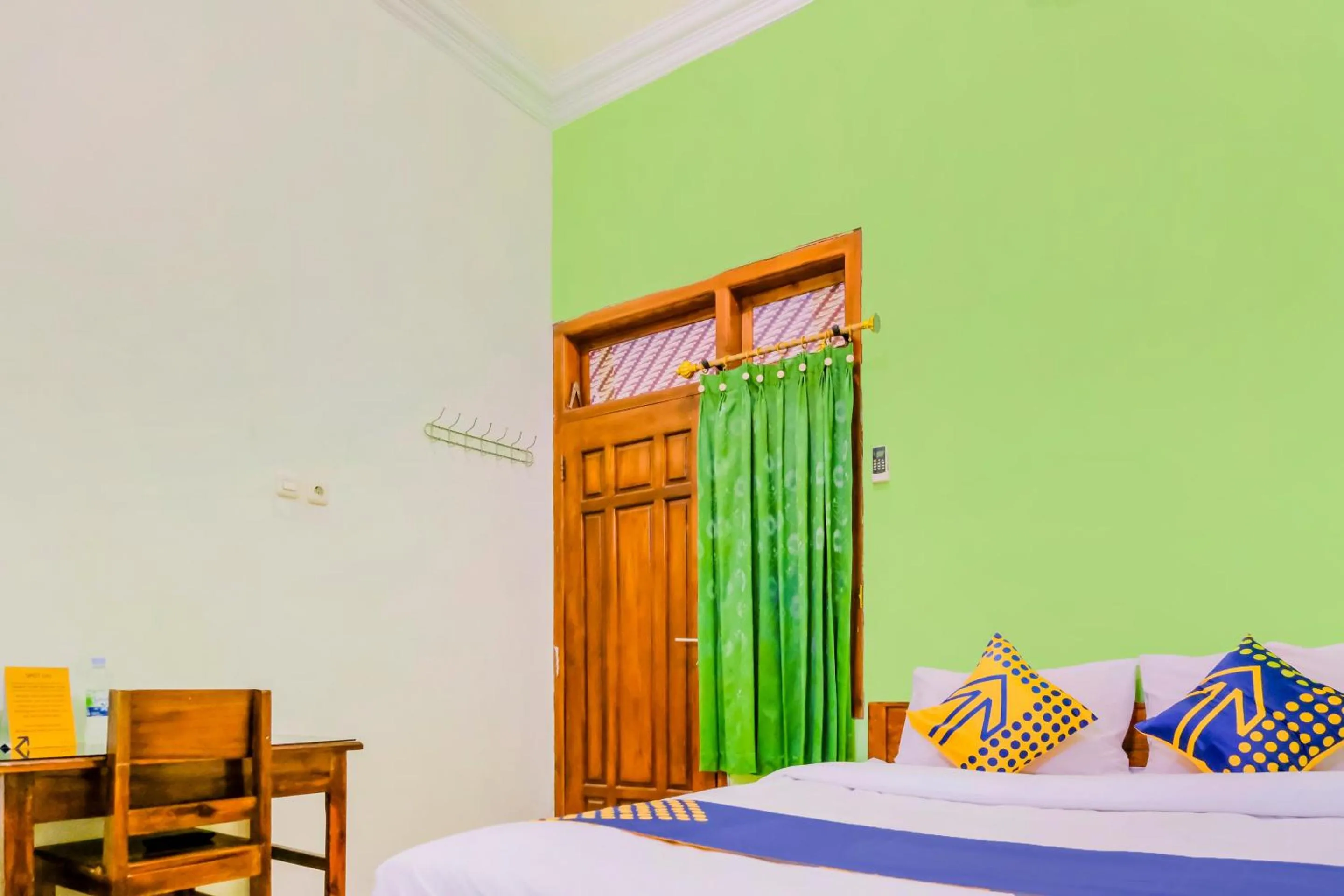 Bed in Hotel O Family Residence Syariah