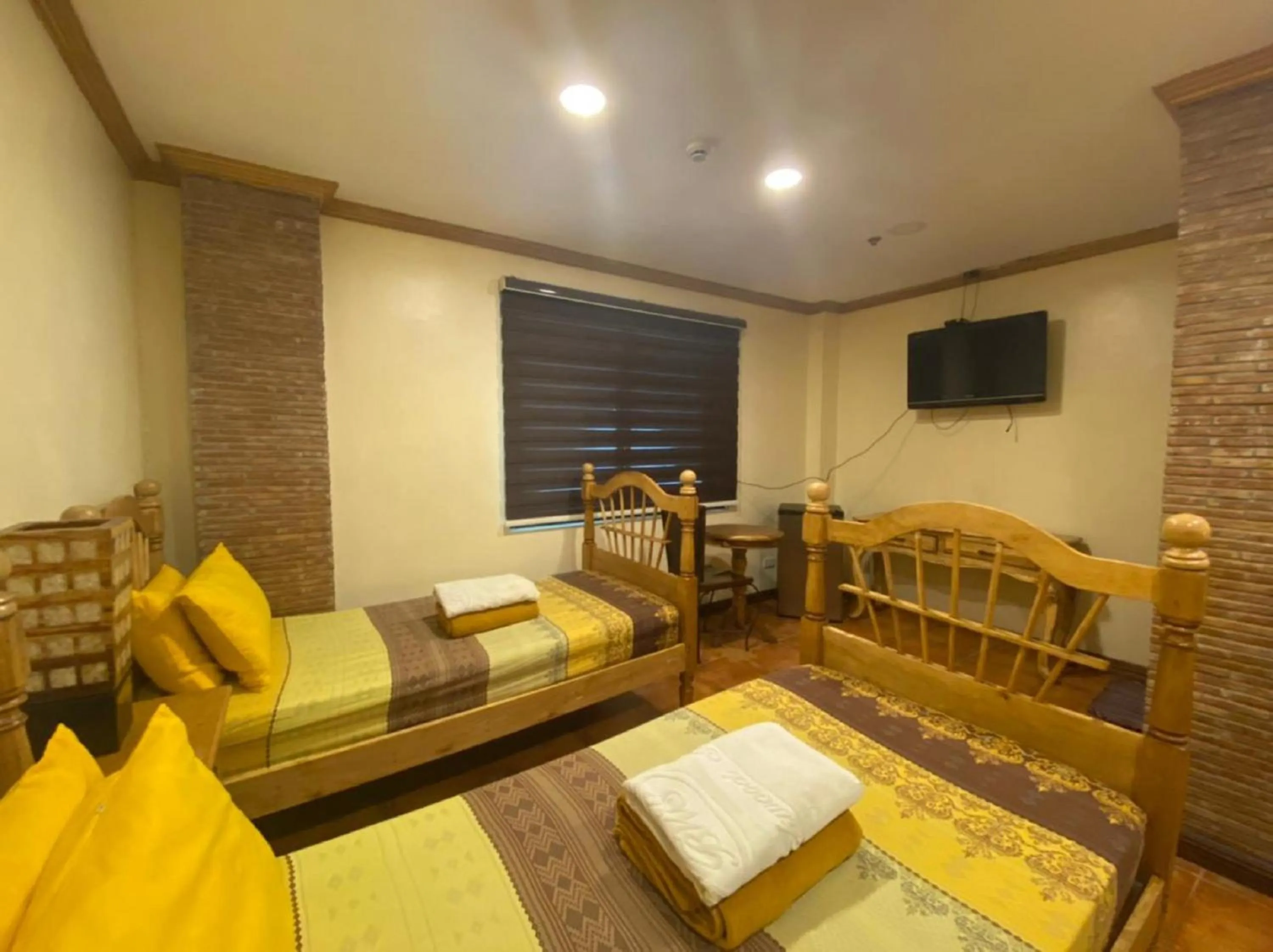 Photo of the whole room, Seating Area in OYO 797 Brickwood Suites