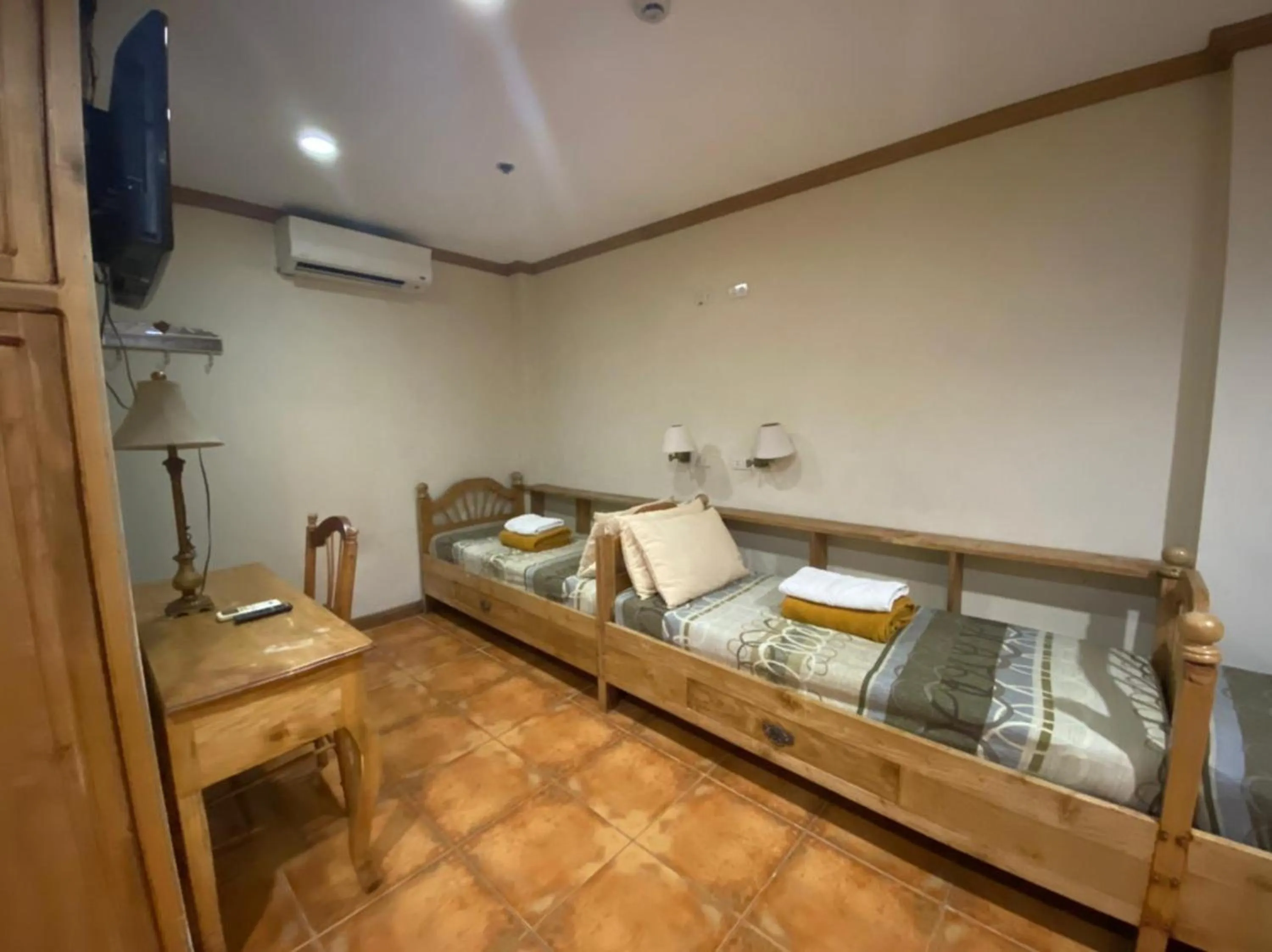 Bedroom, Kitchen/Kitchenette in OYO 797 Brickwood Suites