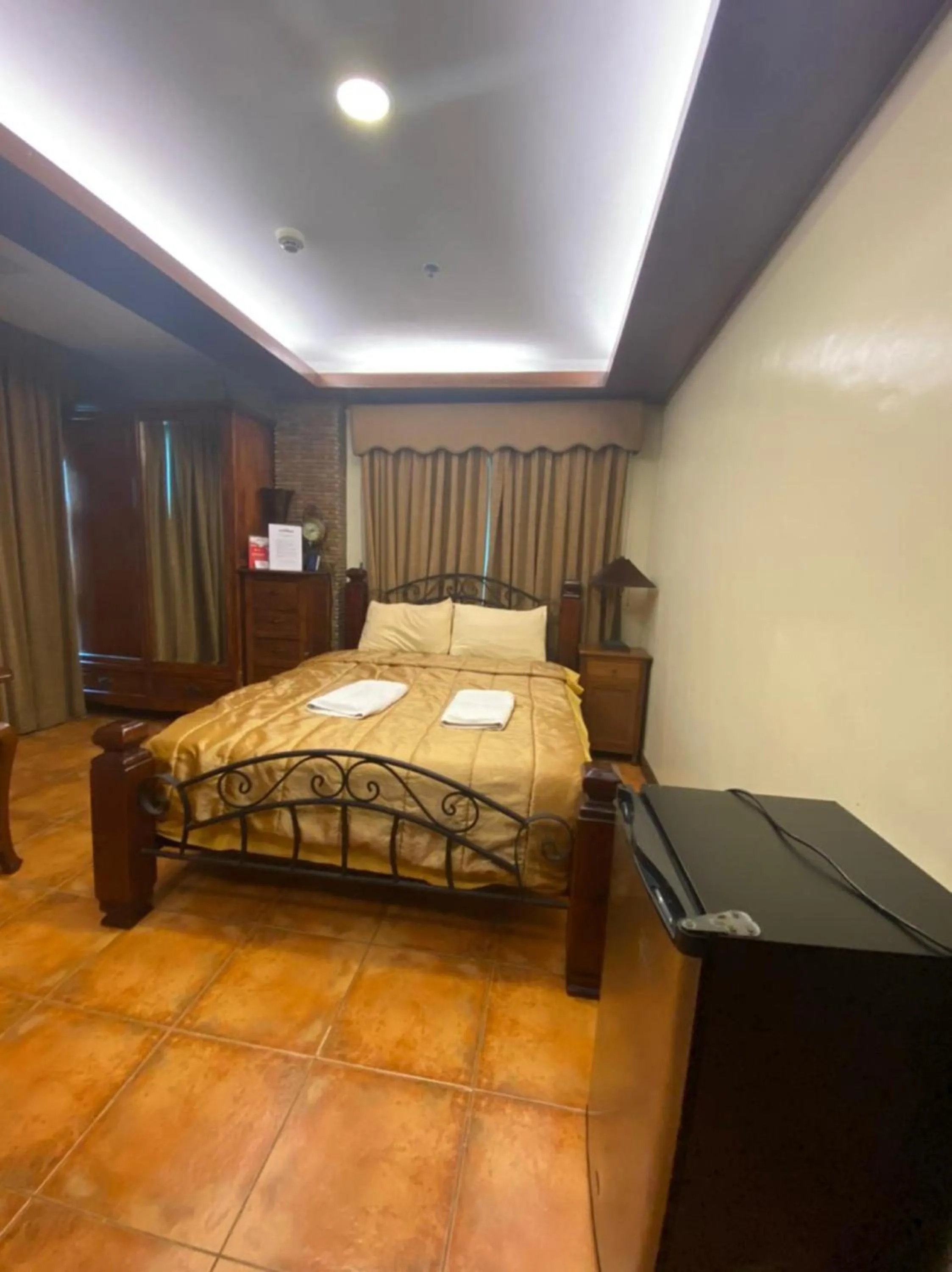 Bedroom in OYO 797 Brickwood Suites