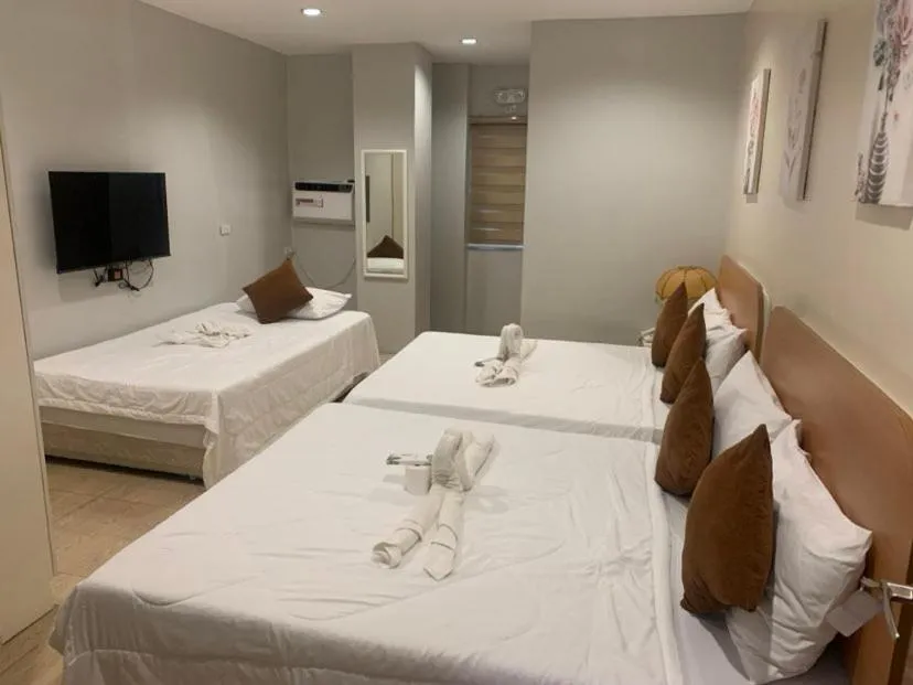 Bed in Casa Bicolandia Suites