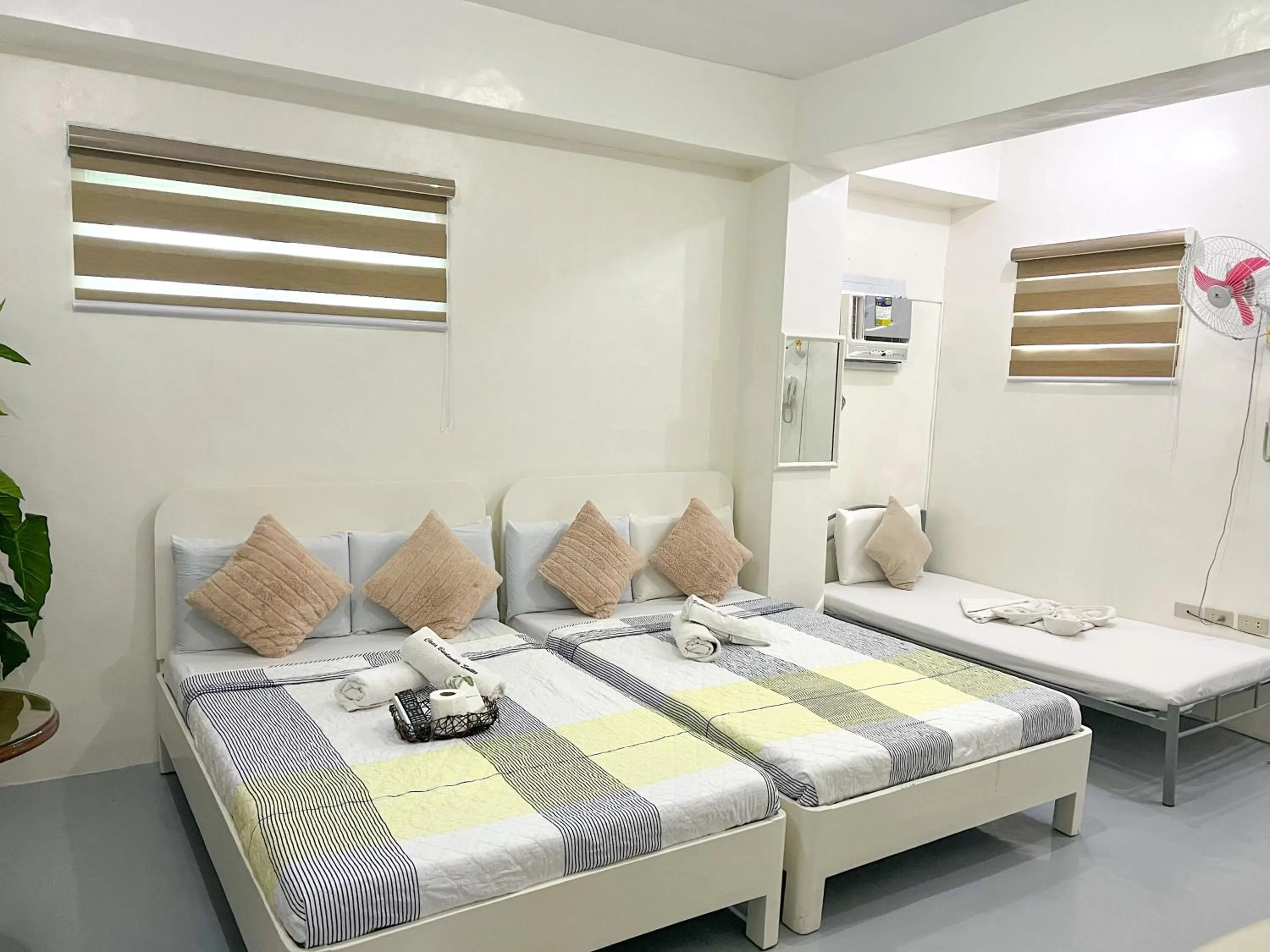 Bed in Casa Bicolandia Suites