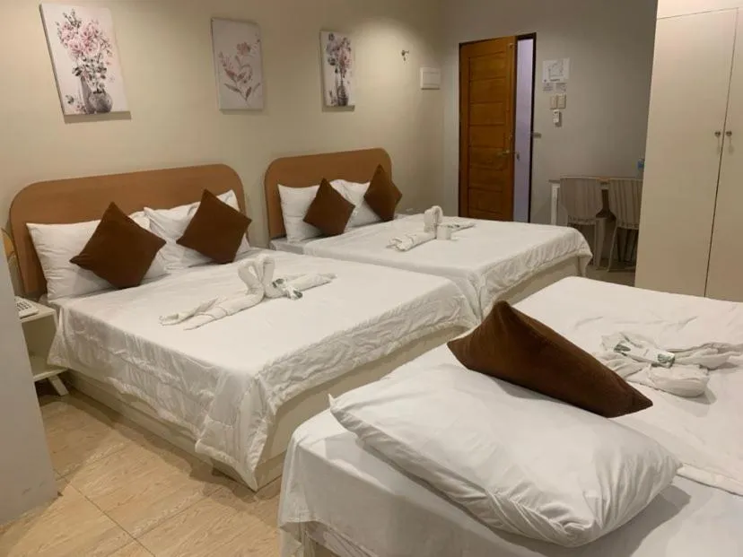 Bed in Casa Bicolandia Suites