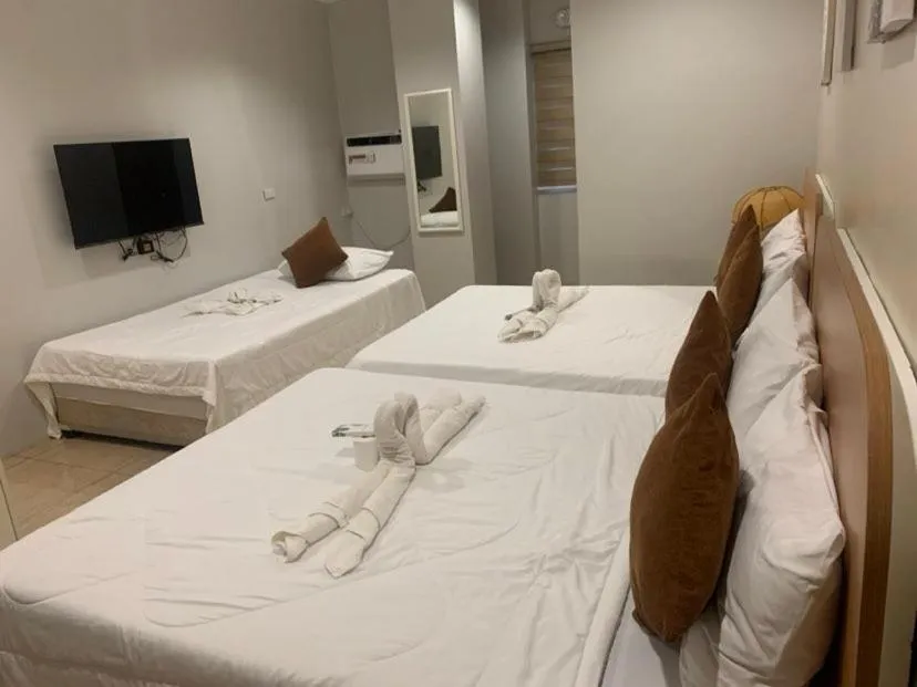 Bed in Casa Bicolandia Suites