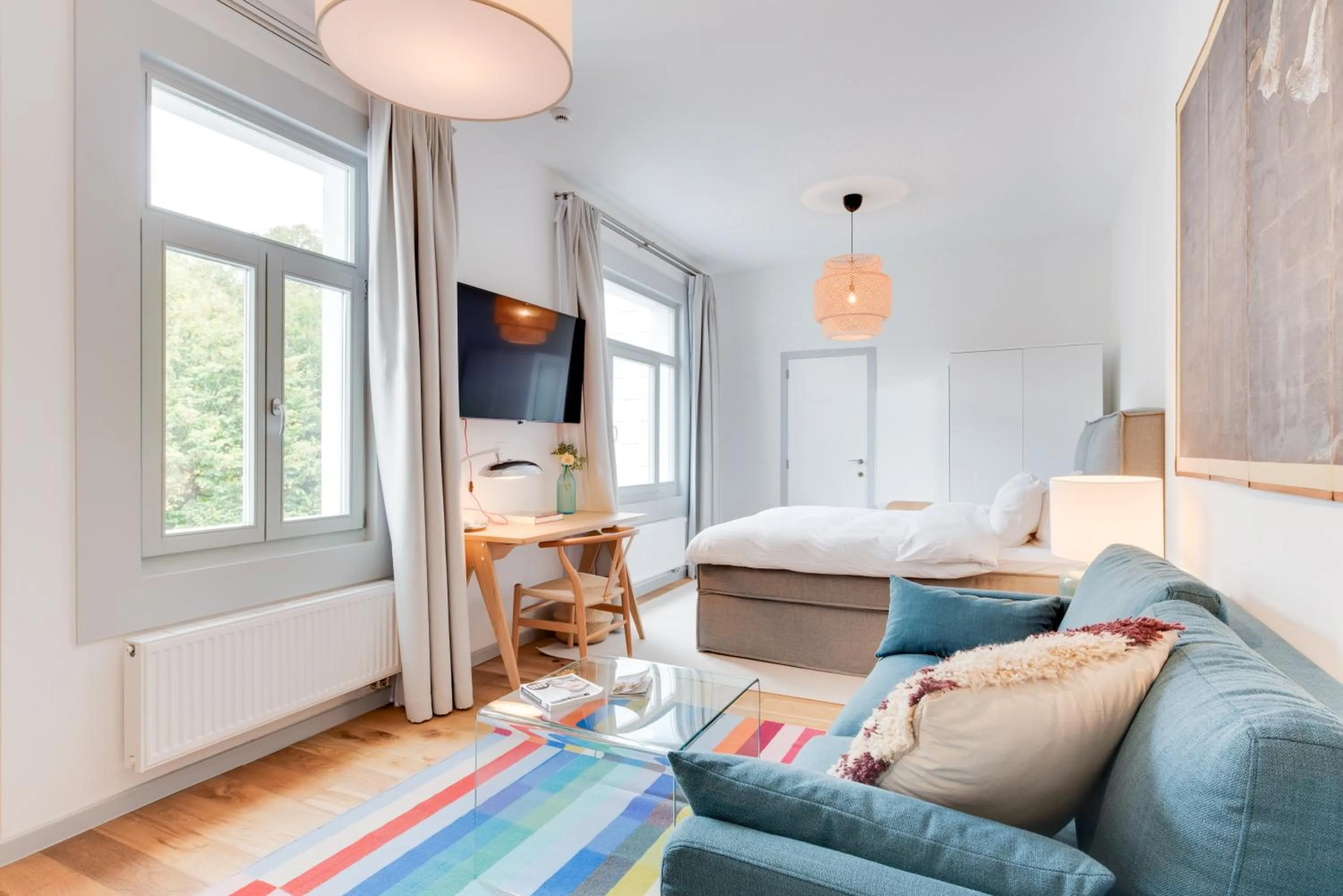 Living room, Bed in Newton Boutique Hotel Residences - Brussels EU Area