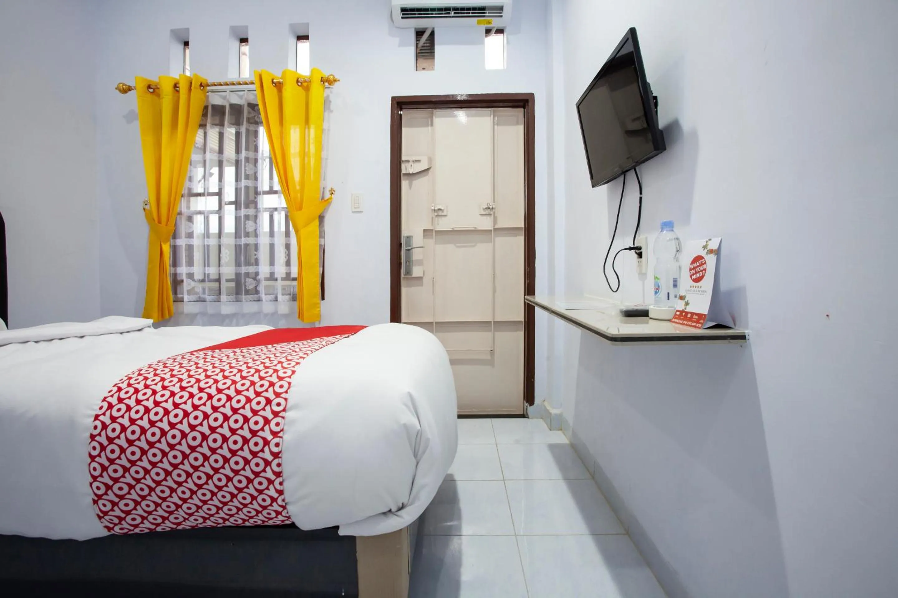 Photo of the whole room in OYO 1764 Sopou Penginapan Rinal & Tuah