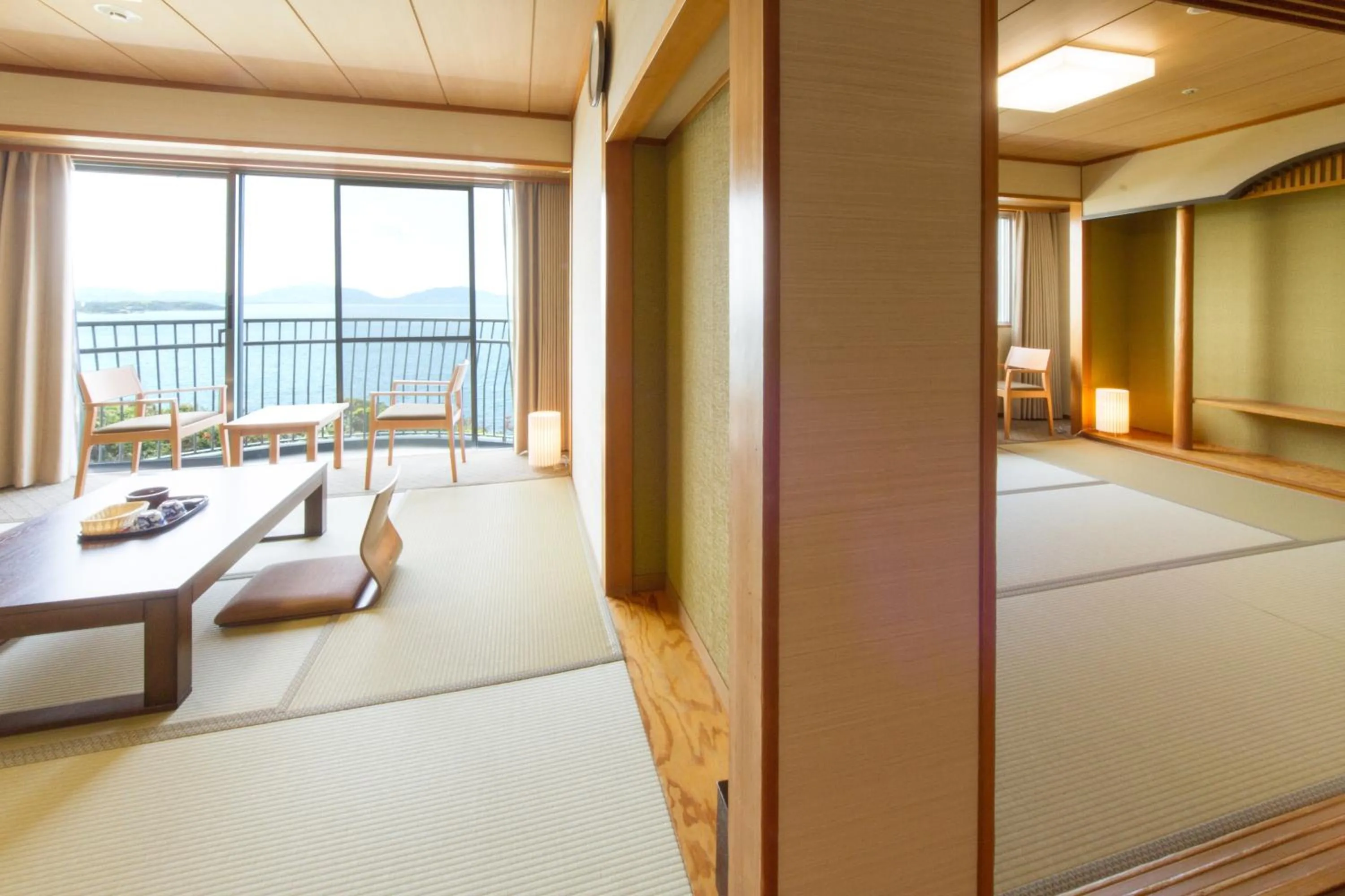 Photo of the whole room, Bed in KAMENOI HOTEL Genkainada