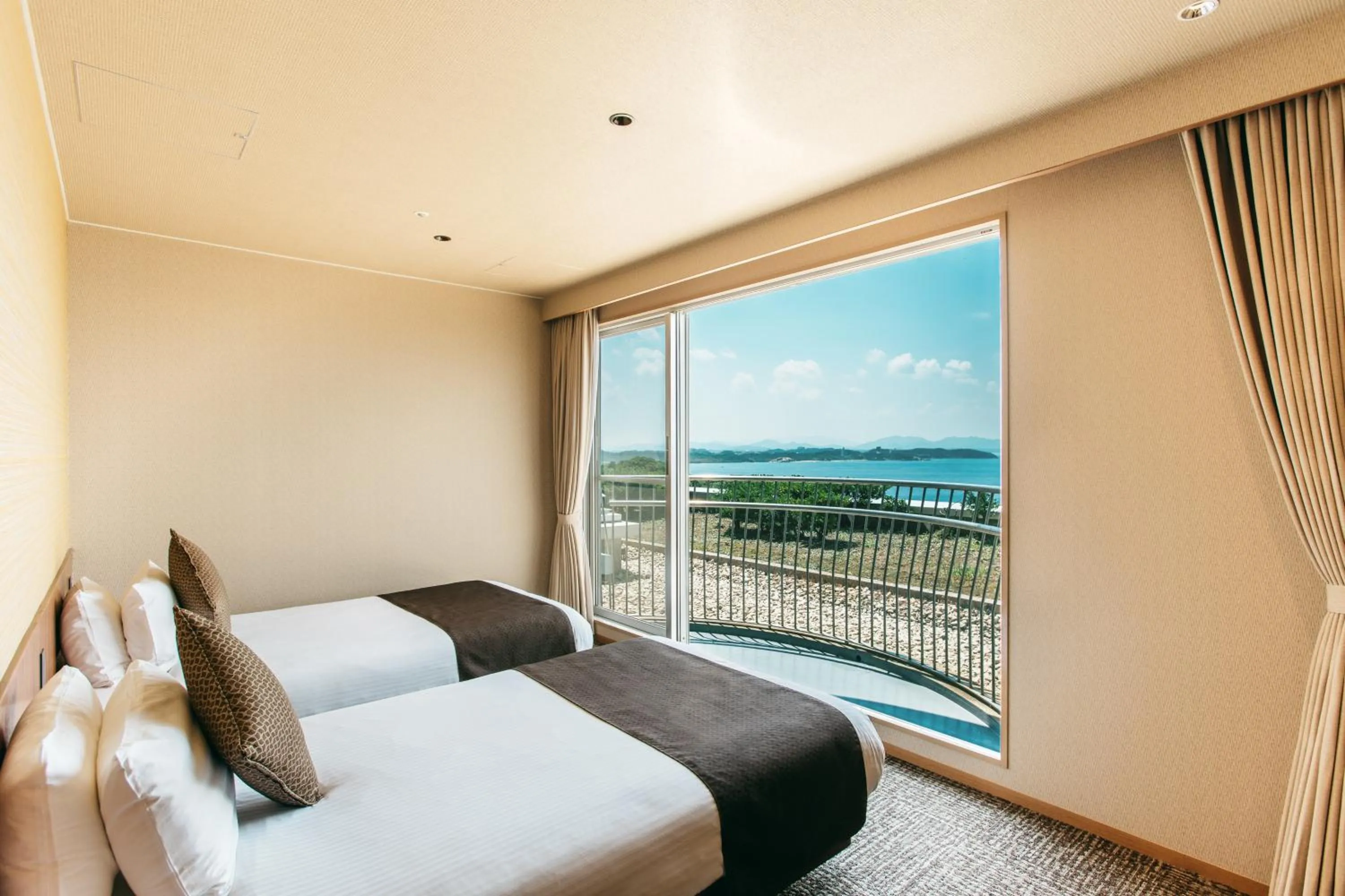 Bed in KAMENOI HOTEL Genkainada