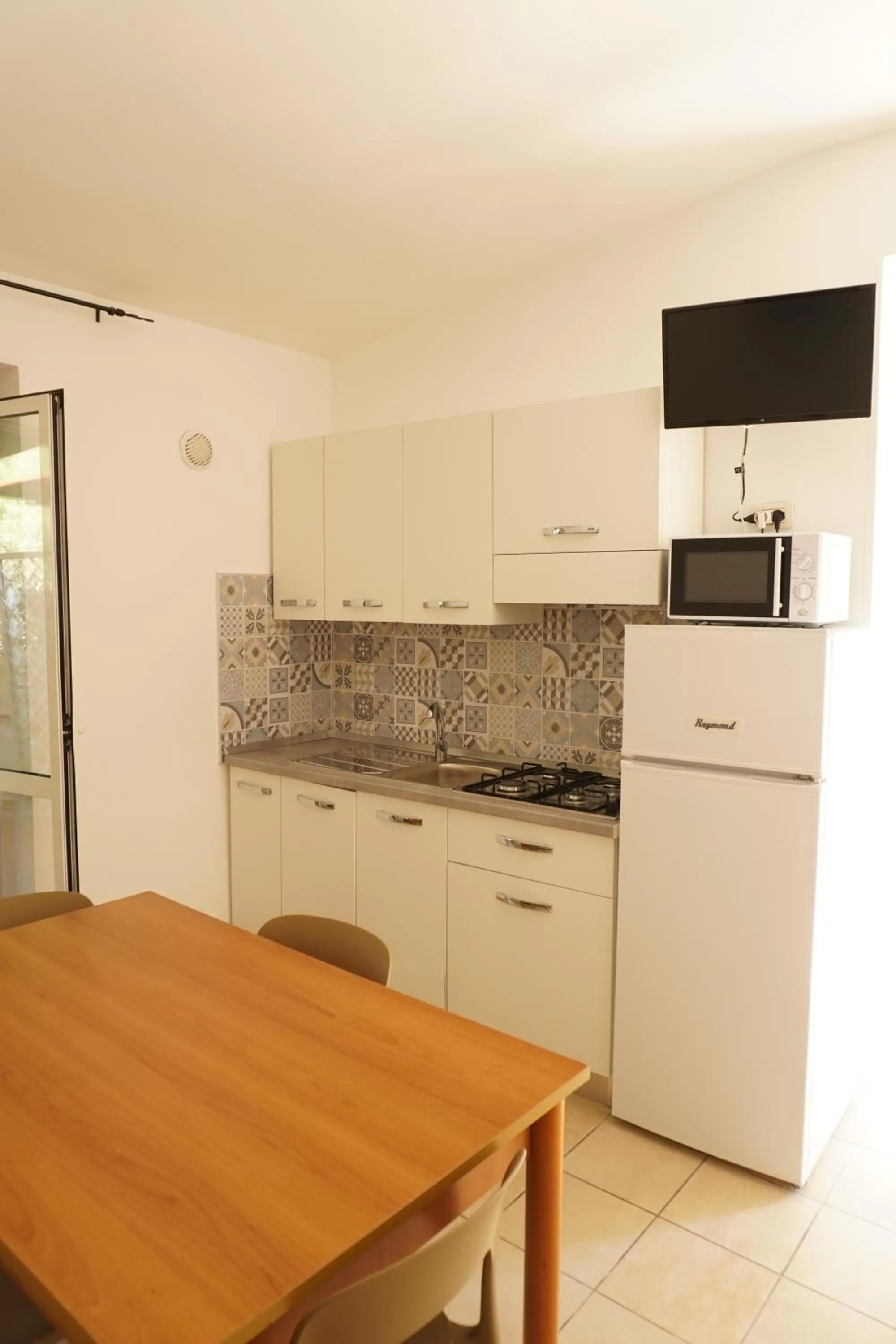 Kitchen or kitchenette in Residence Il Falco