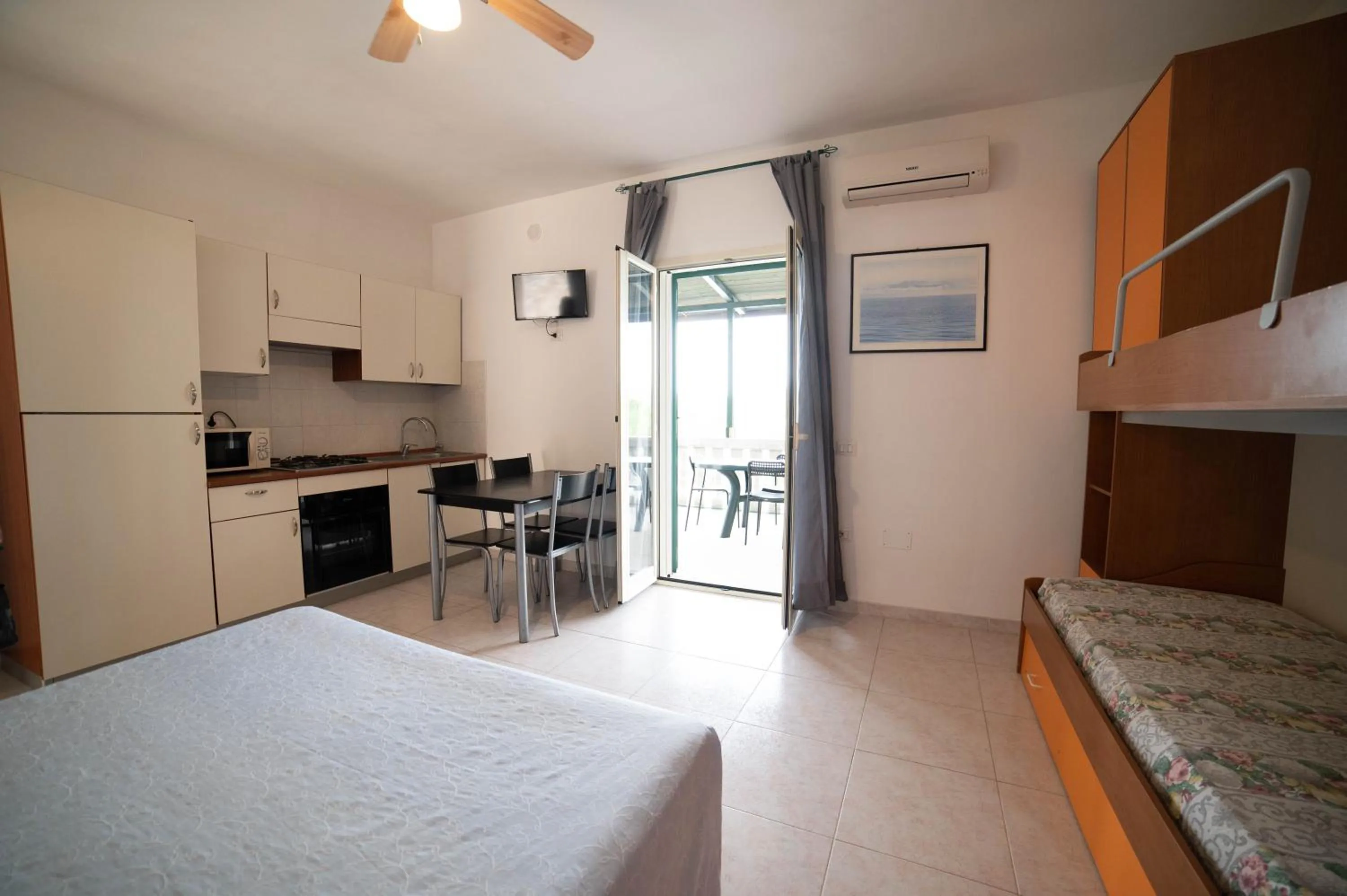 Kitchen or kitchenette, Bed in Residence Il Falco