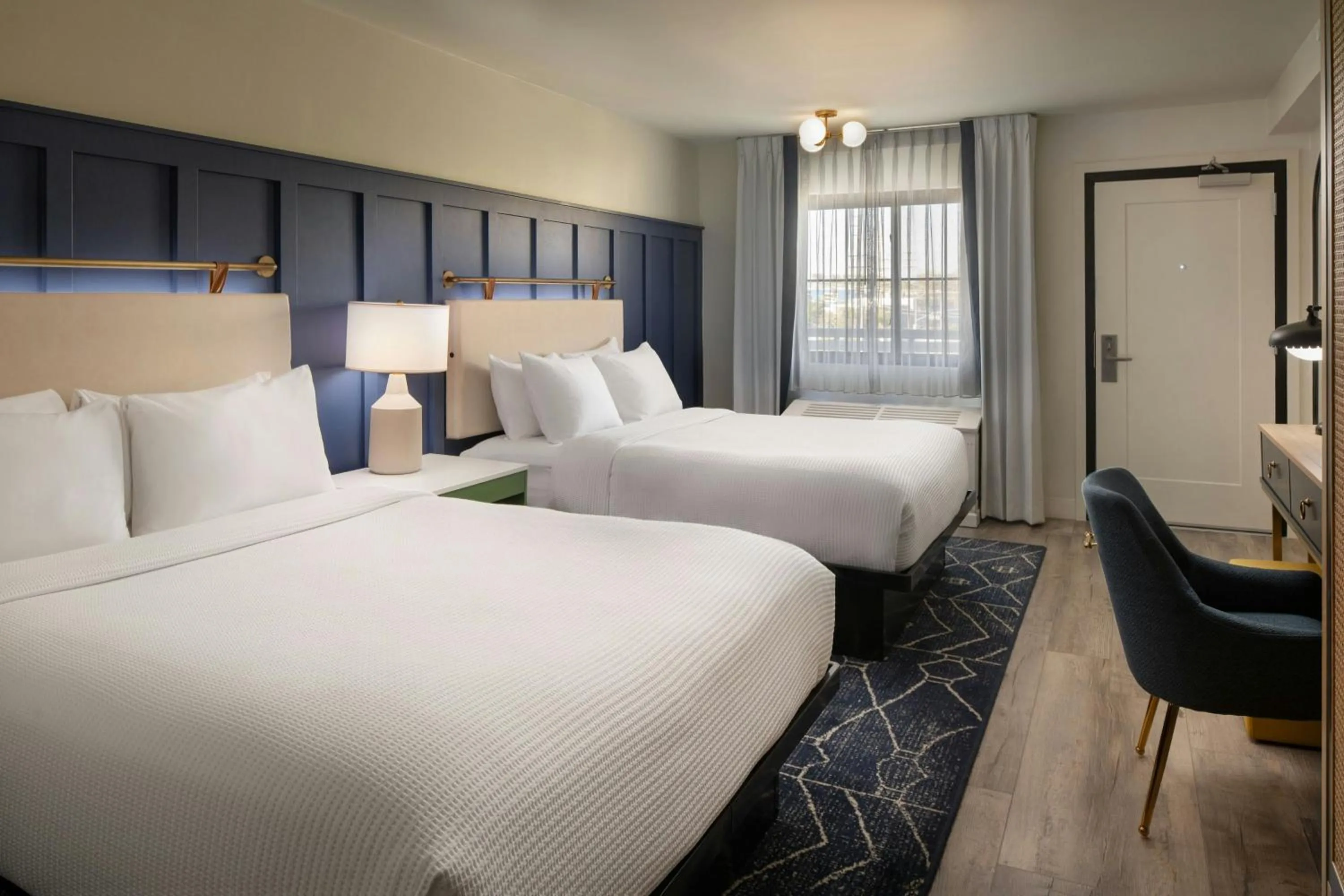 Photo of the whole room, Bed in Tiller House, Laguna Hills, a Tribute Portfolio Hotel