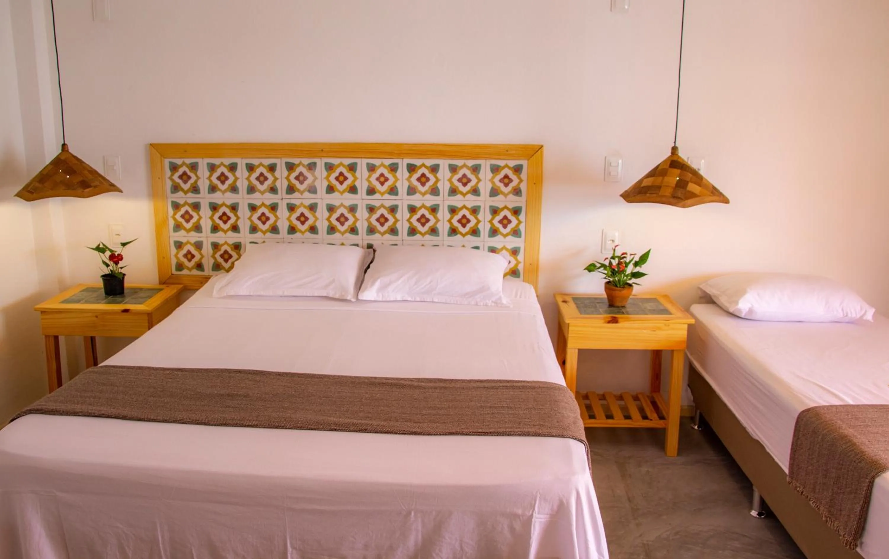 Bed in Pousada Chez Toi