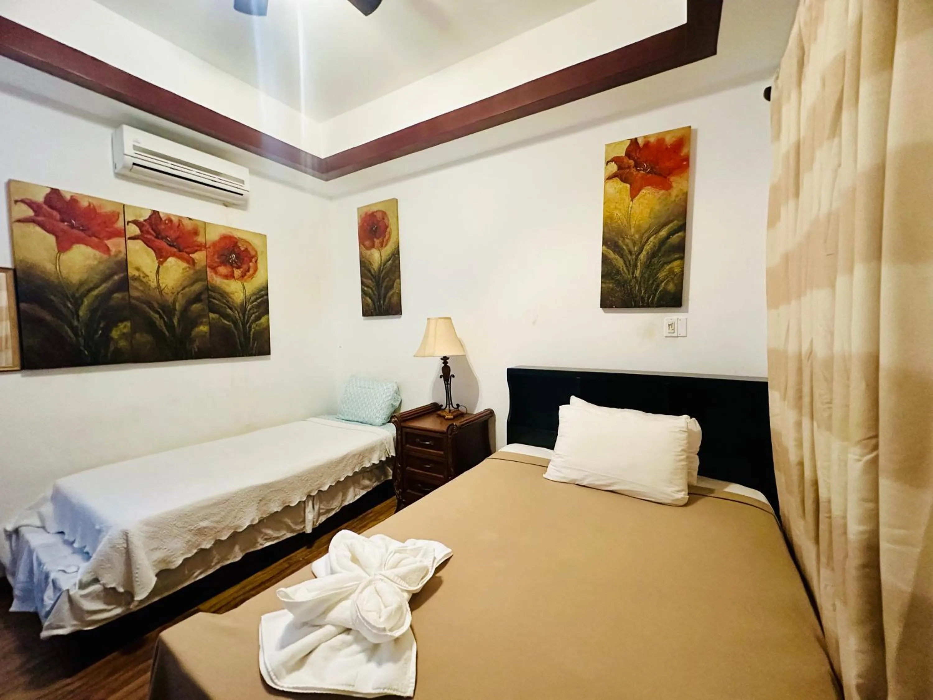 Photo of the whole room, Bed in Hotel Royal Blue & Golf Cart Rental