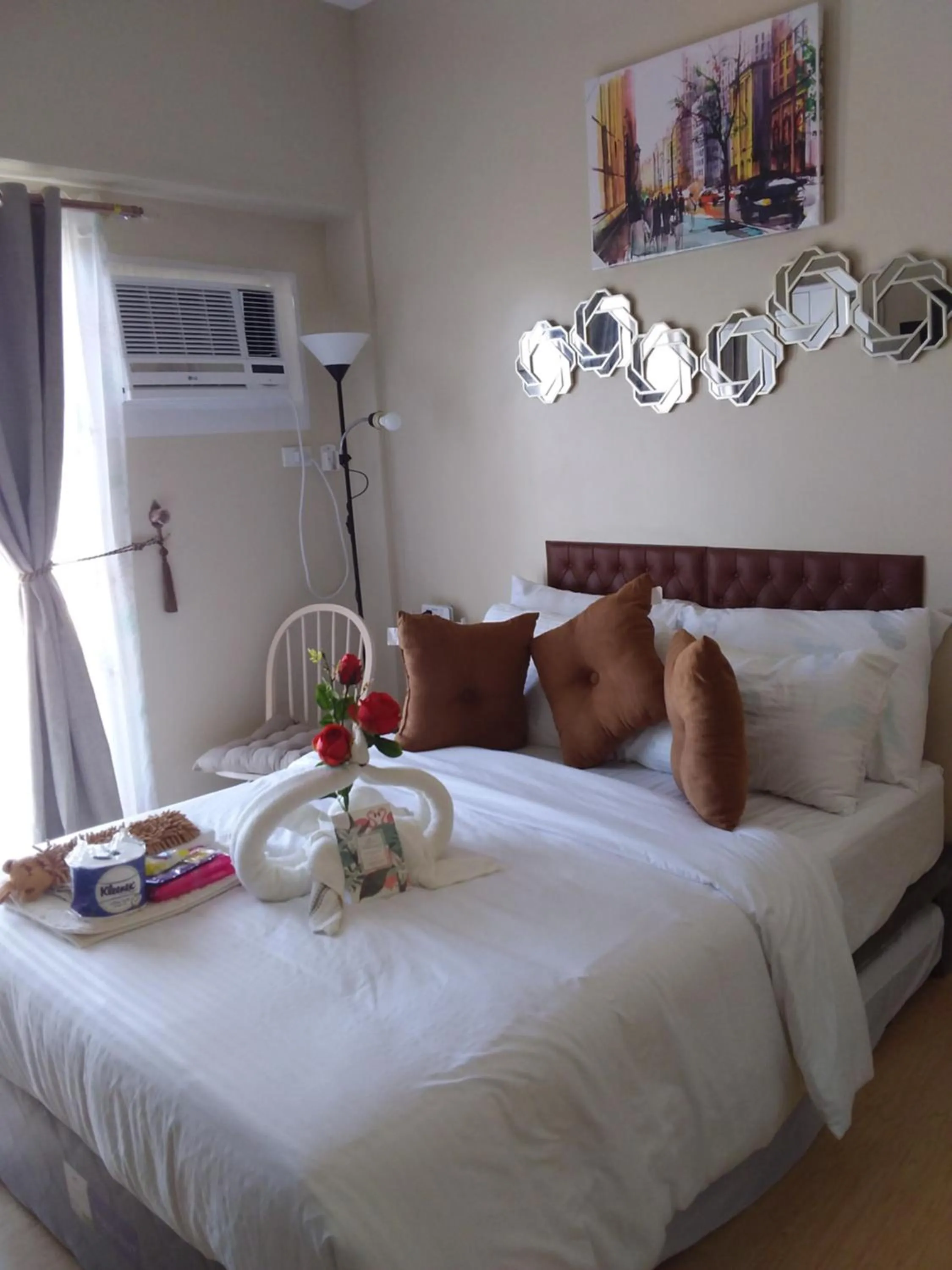 Bed in AJ Sundiva Tower w balcony