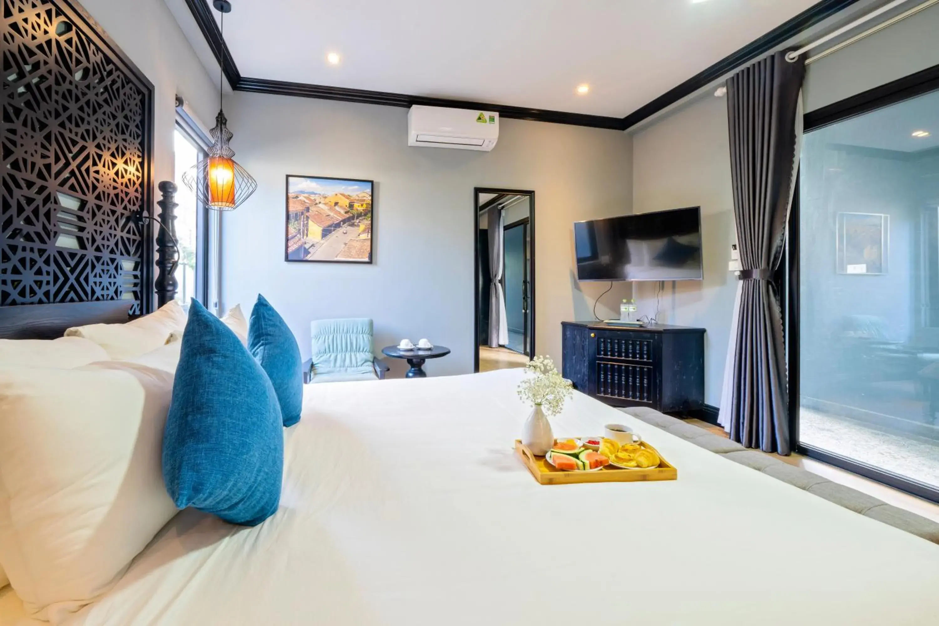 Bed in Daisy An Bang Villa Bed in Daisy An Bang Villa