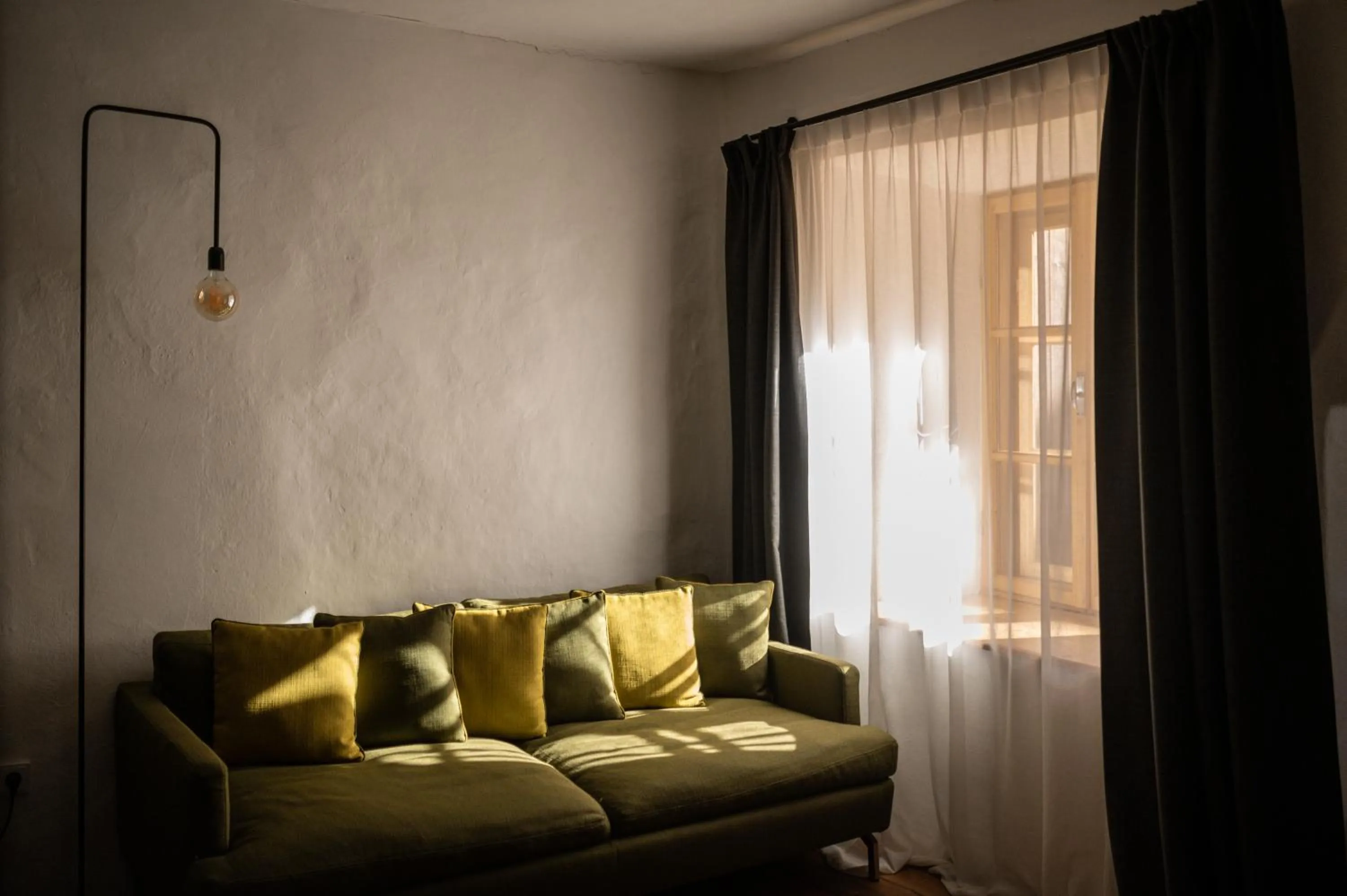 Living room in flurin Suites