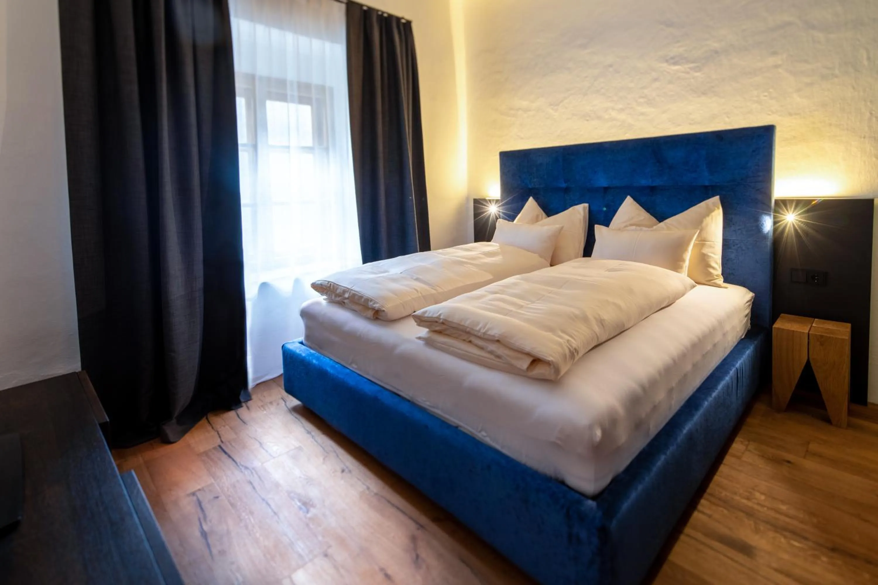 Bed in Flurin Suites