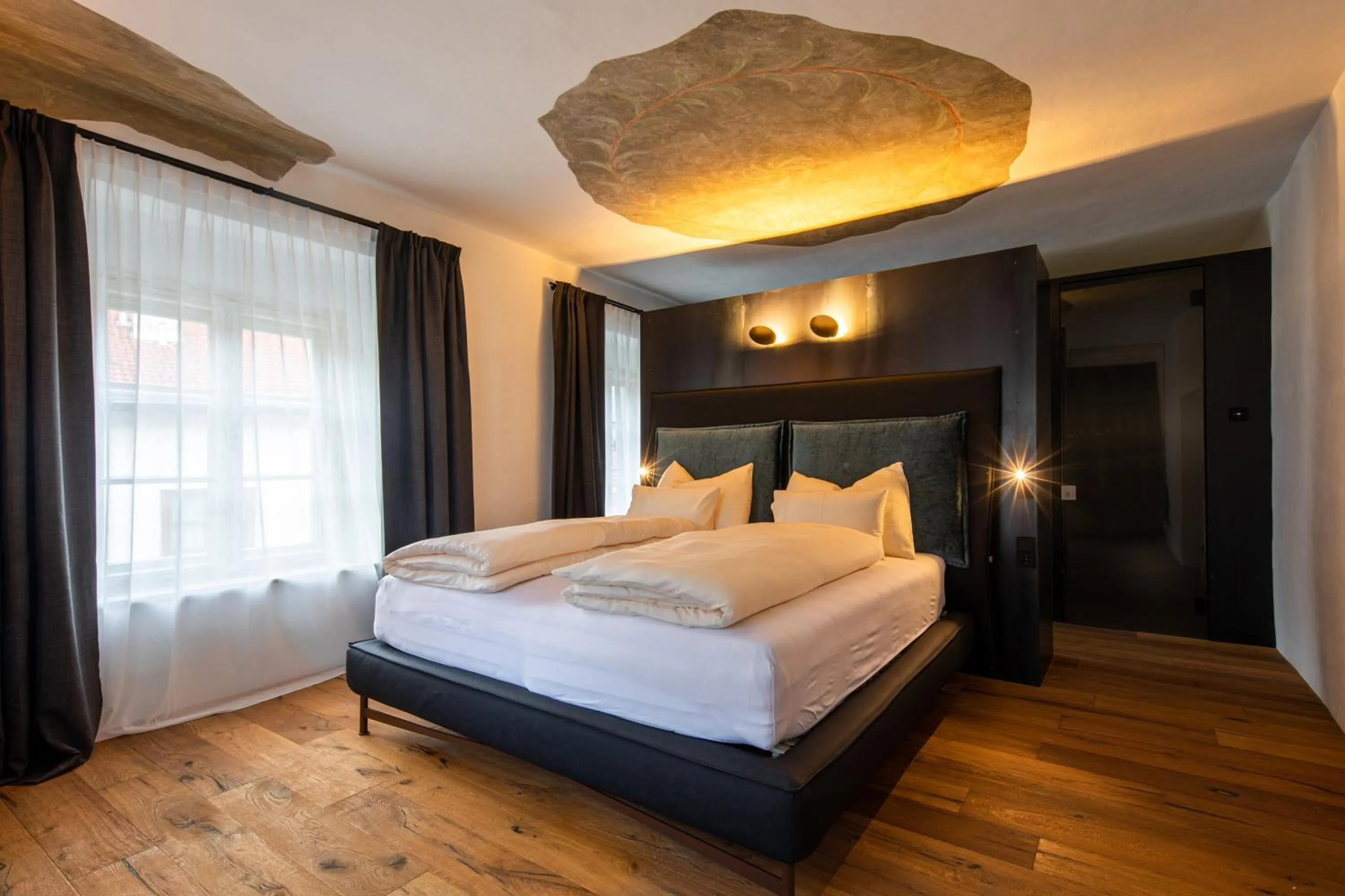 Bed in Flurin Suites